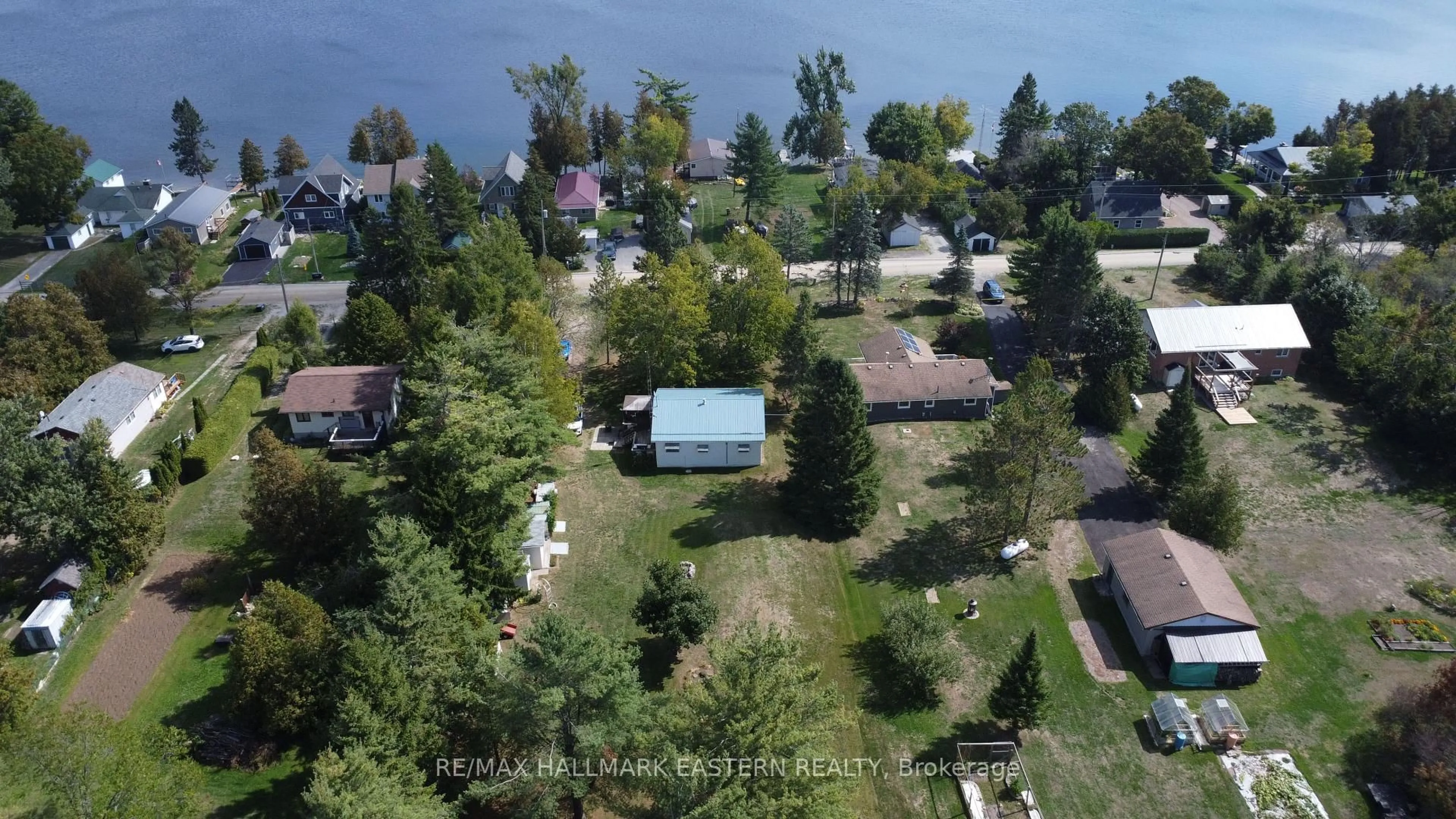A pic from outside/outdoor area/front of a property/back of a property/a pic from drone, water/lake/river/ocean view for 46 Lakeview Cottage Rd, Kawartha Lakes Ontario K0M 2B0