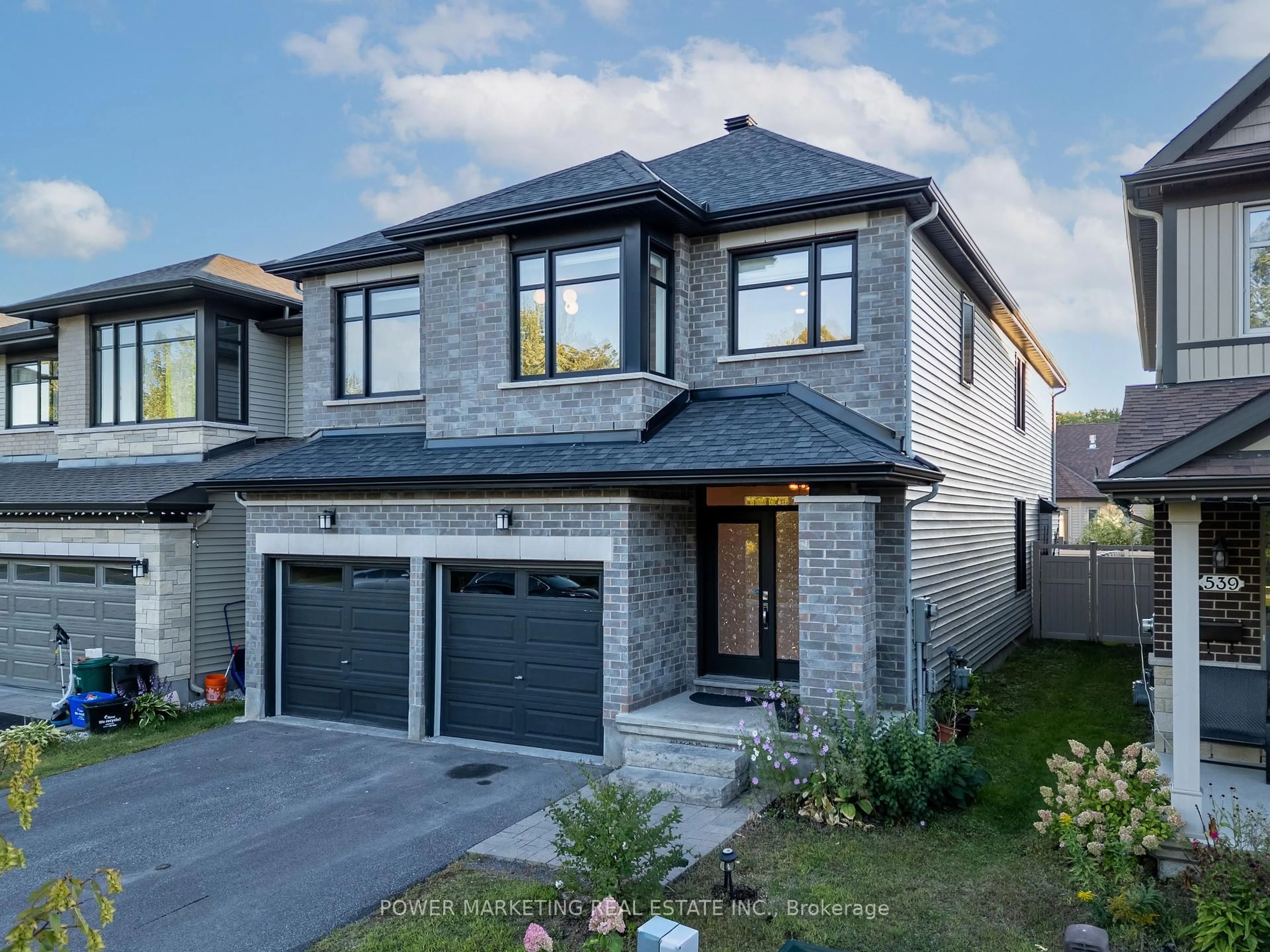 Home with brick exterior material, street for 537 Compass St, Orleans Ontario K1W 0J1