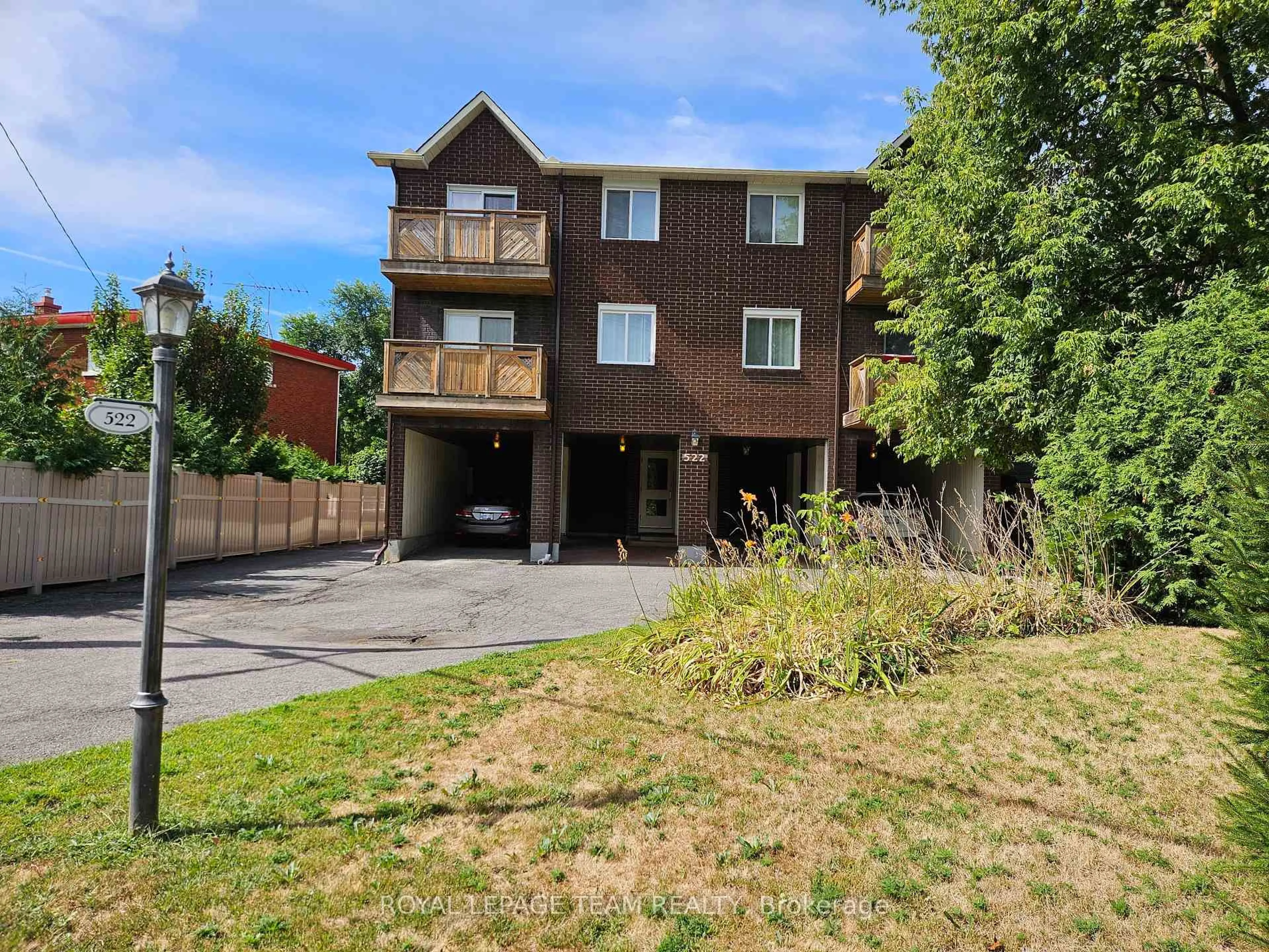 A pic from outside/outdoor area/front of a property/back of a property/a pic from drone, street for 522 Riverdale Ave #5, Ottawa Ontario K1S 1S5