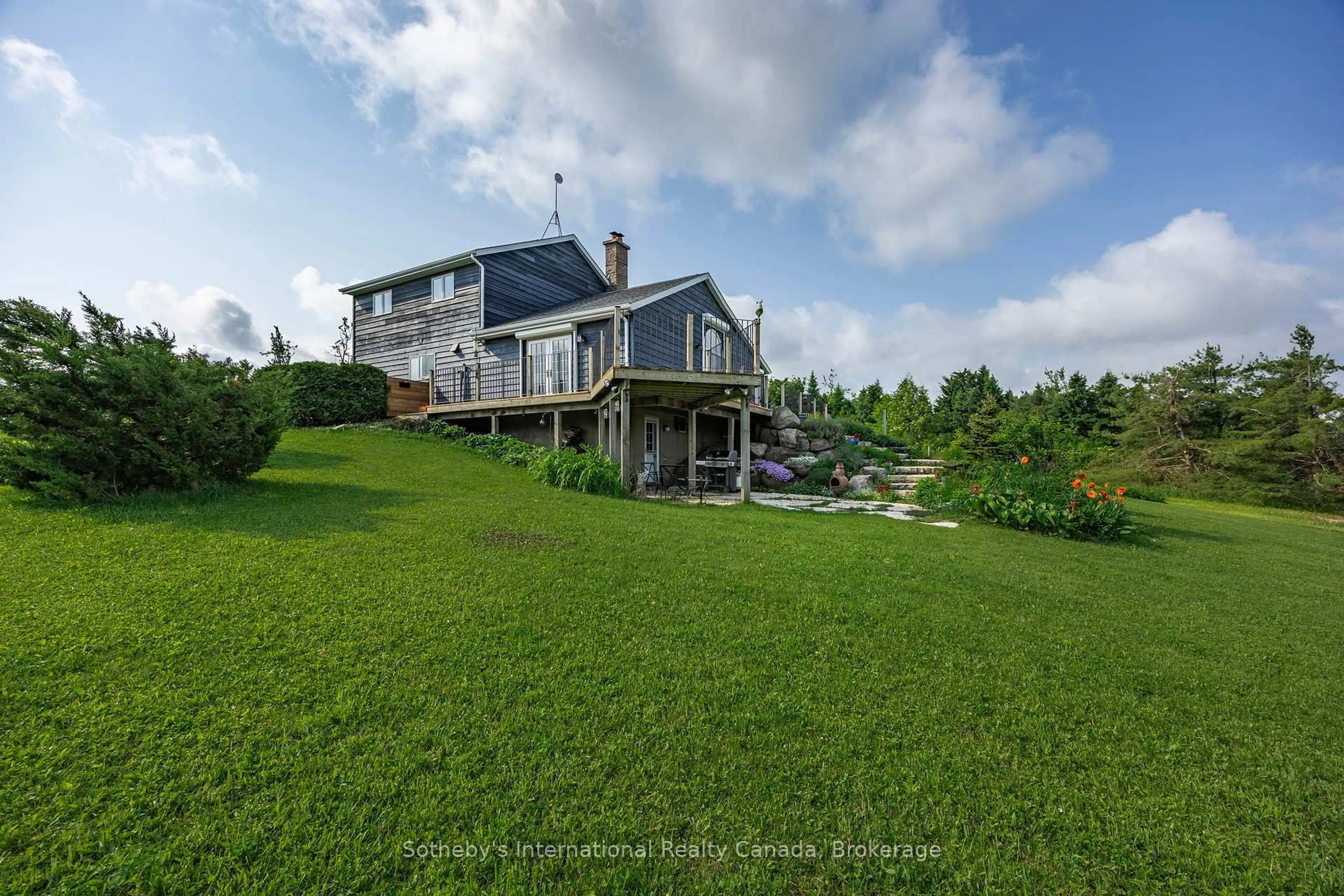 A pic from outside/outdoor area/front of a property/back of a property/a pic from drone, water/lake/river/ocean view for 758693 2nd Line, Mulmur Ontario L9V 0H1