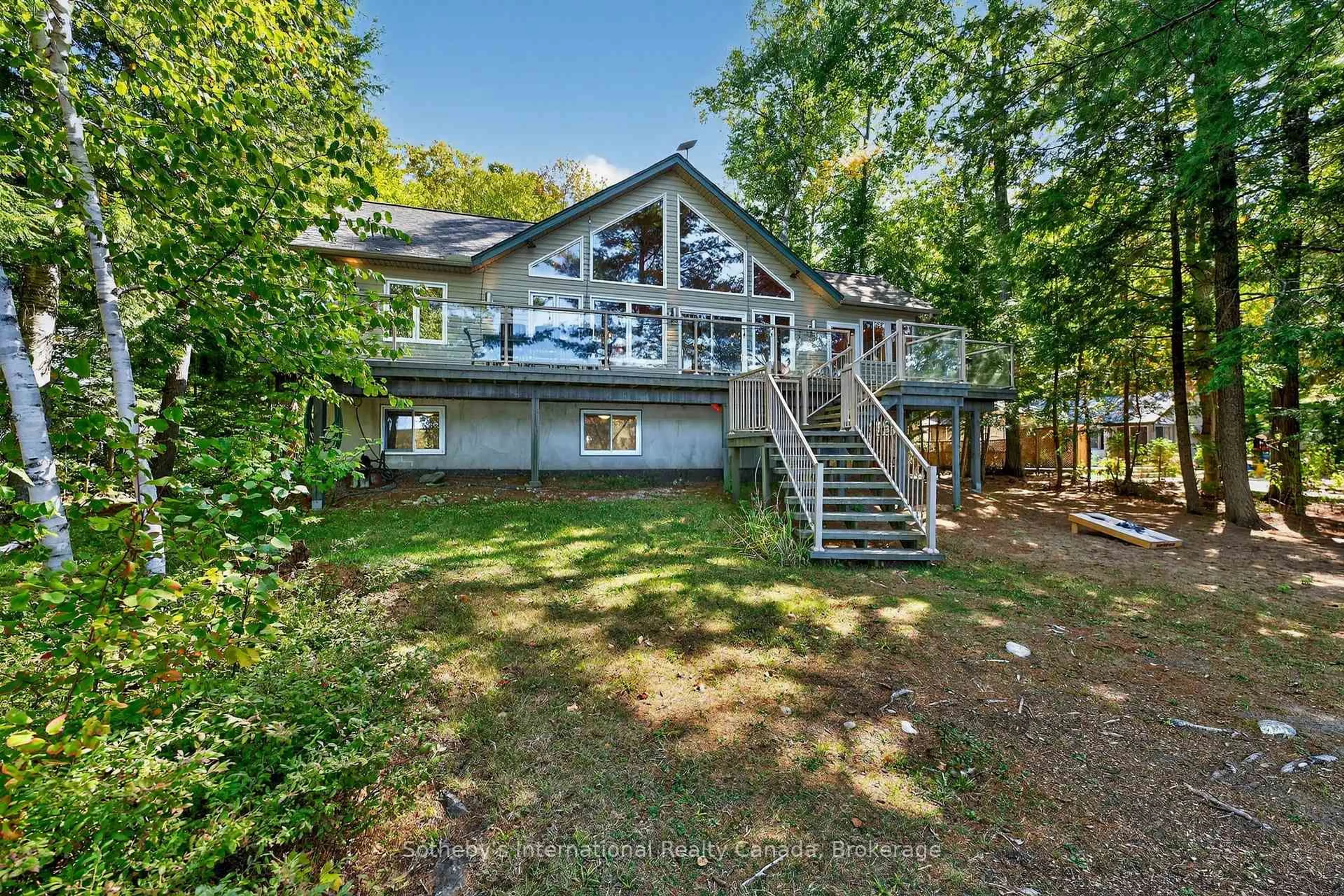 A pic from outside/outdoor area/front of a property/back of a property/a pic from drone, water/lake/river/ocean view for 1352 Dignan Rd, Dysart et al Ontario K0M 1S0