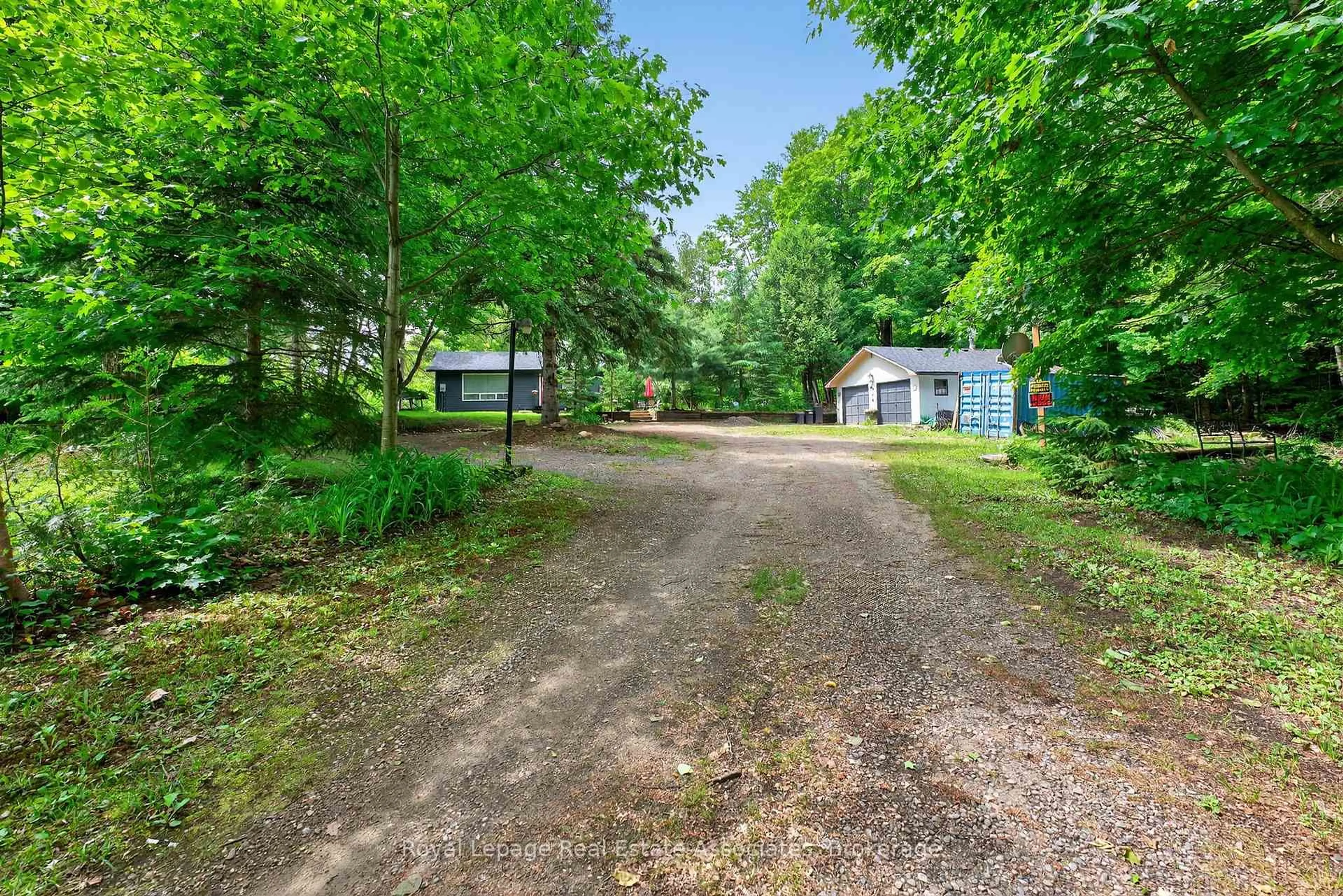 A pic from outside/outdoor area/front of a property/back of a property/a pic from drone, street for 17377 35 Highway, Algonquin Highlands Ontario K0M 1J2