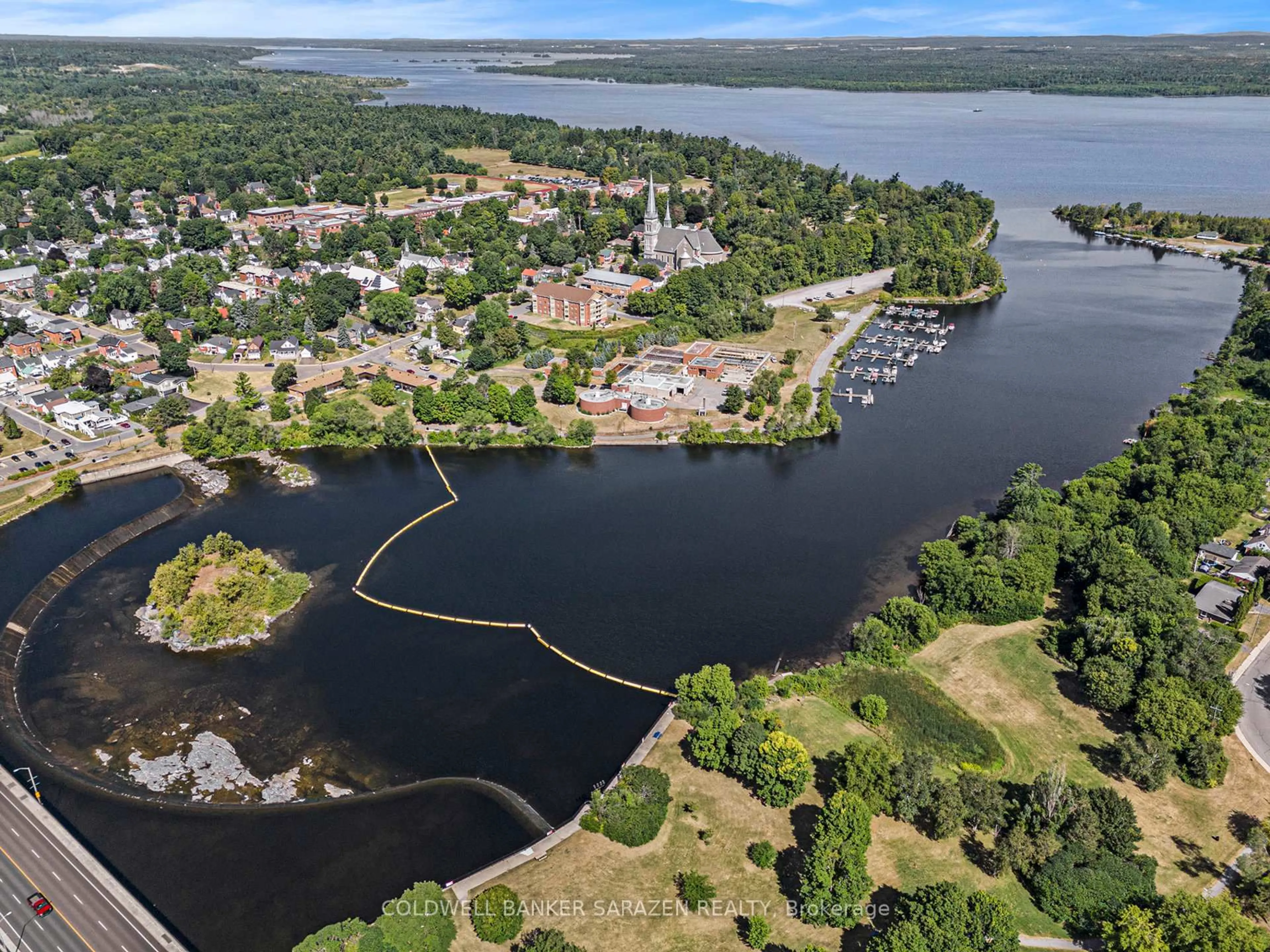 A pic from outside/outdoor area/front of a property/back of a property/a pic from drone, water/lake/river/ocean view for 259 Albert St #107, Arnprior Ontario K7S 2M4