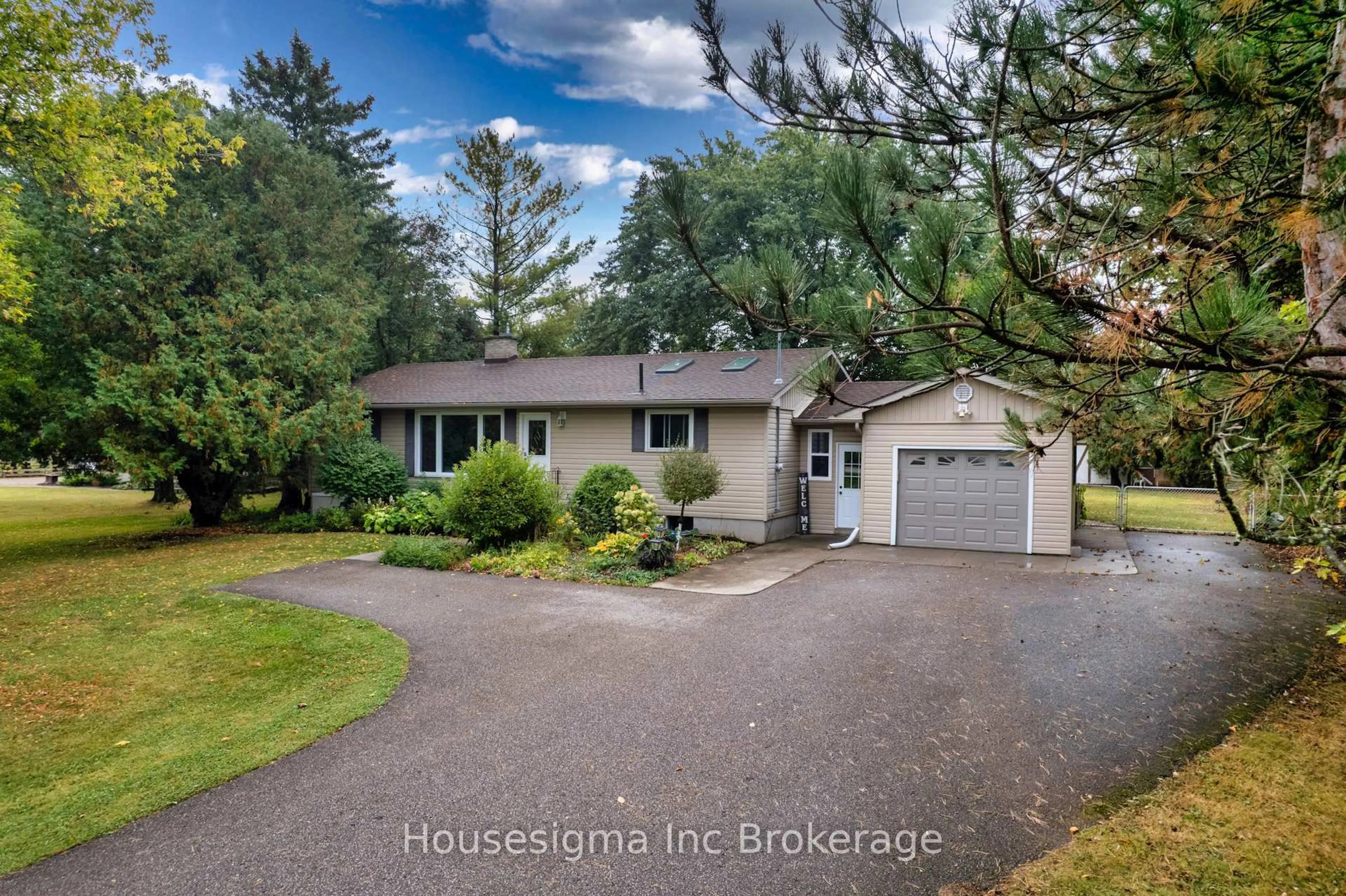 A pic from outside/outdoor area/front of a property/back of a property/a pic from drone, street for 754749 Oxford Rd. 55 Hwy 53 Rd, Norwich Ontario N4S 7W3
