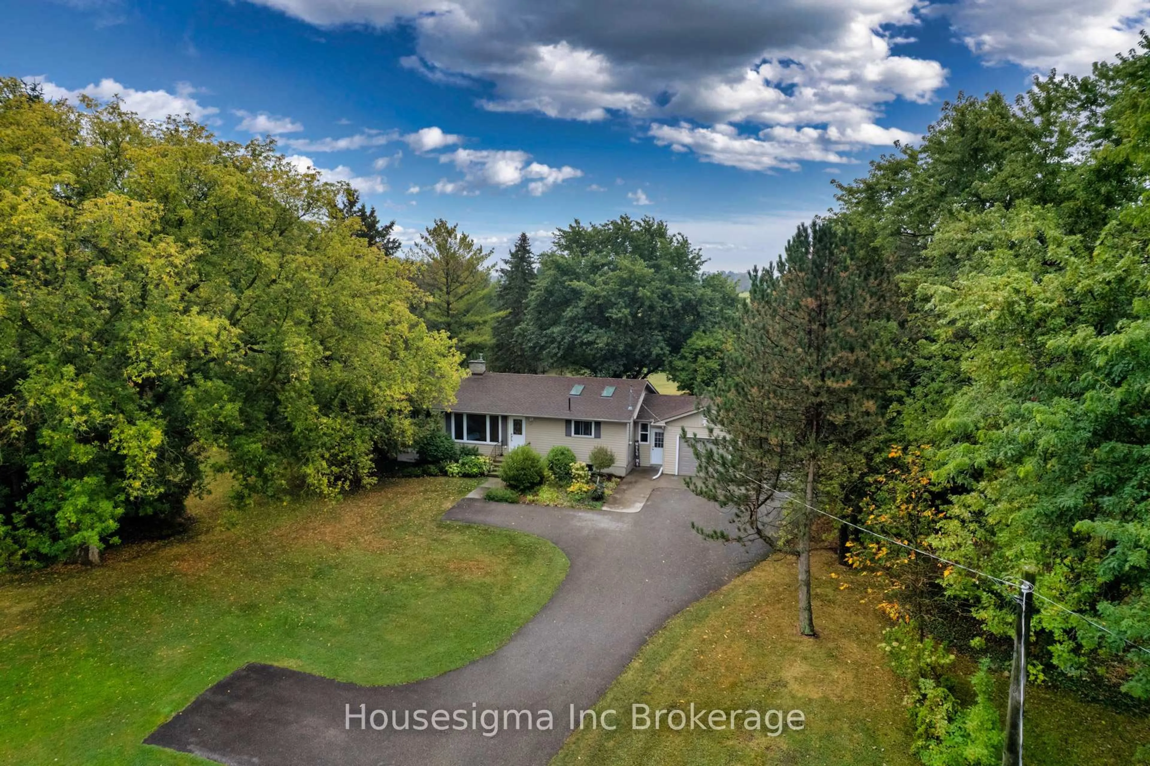 A pic from outside/outdoor area/front of a property/back of a property/a pic from drone, street for 754749 Oxford Rd. 55 Hwy 53 Rd, Norwich Ontario N4S 7W3