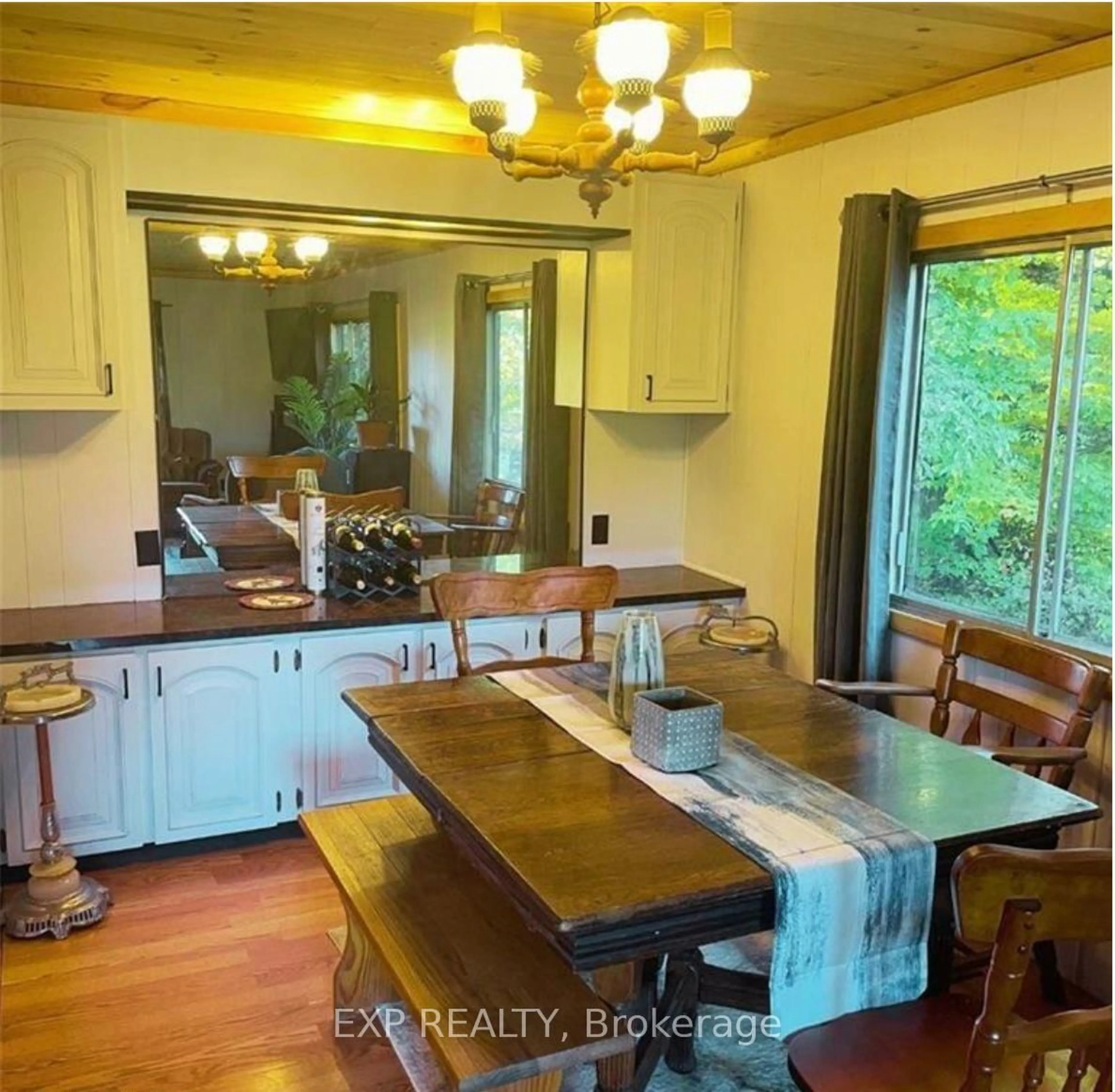 Open concept kitchen, wood/laminate floor for 813016 East Back Line, Grey Highlands Ontario N0C 1L0