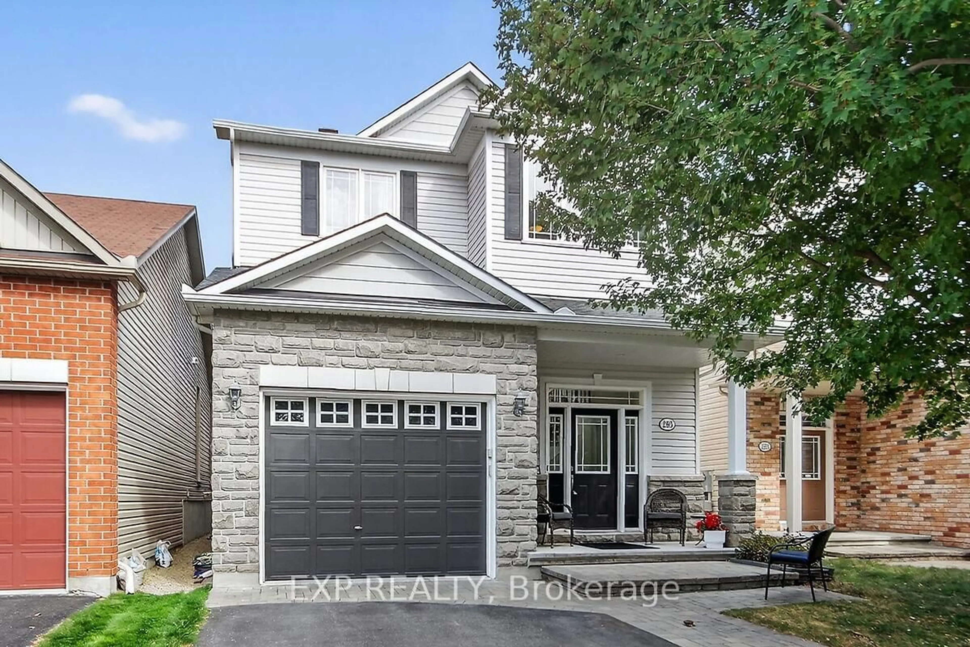 Home with brick exterior material, street for 295 Harthill Way, Ottawa Ontario K2J 0P3