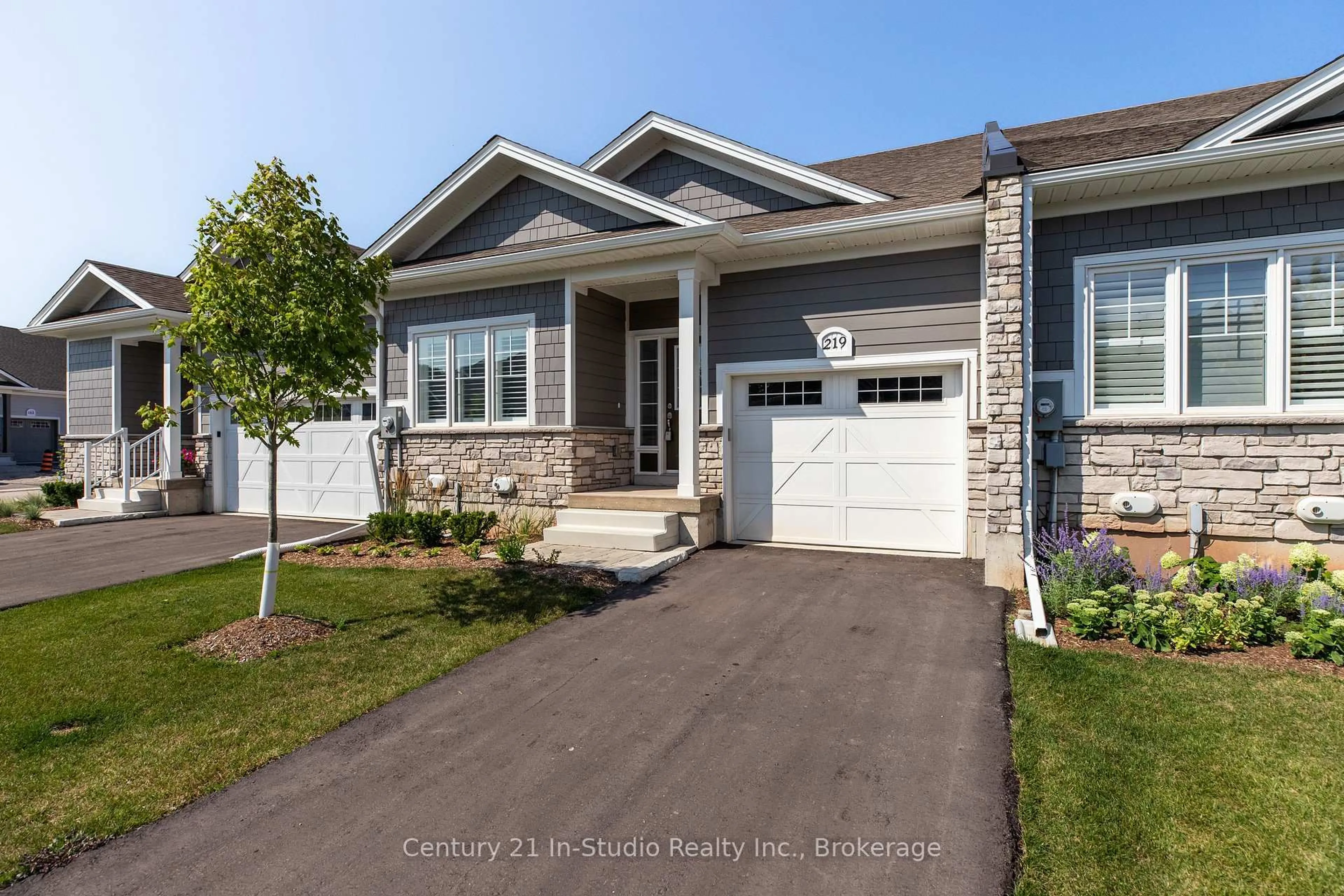 Home with vinyl exterior material, street for 219 Ironwood Way, Georgian Bluffs Ontario N0H 1S0