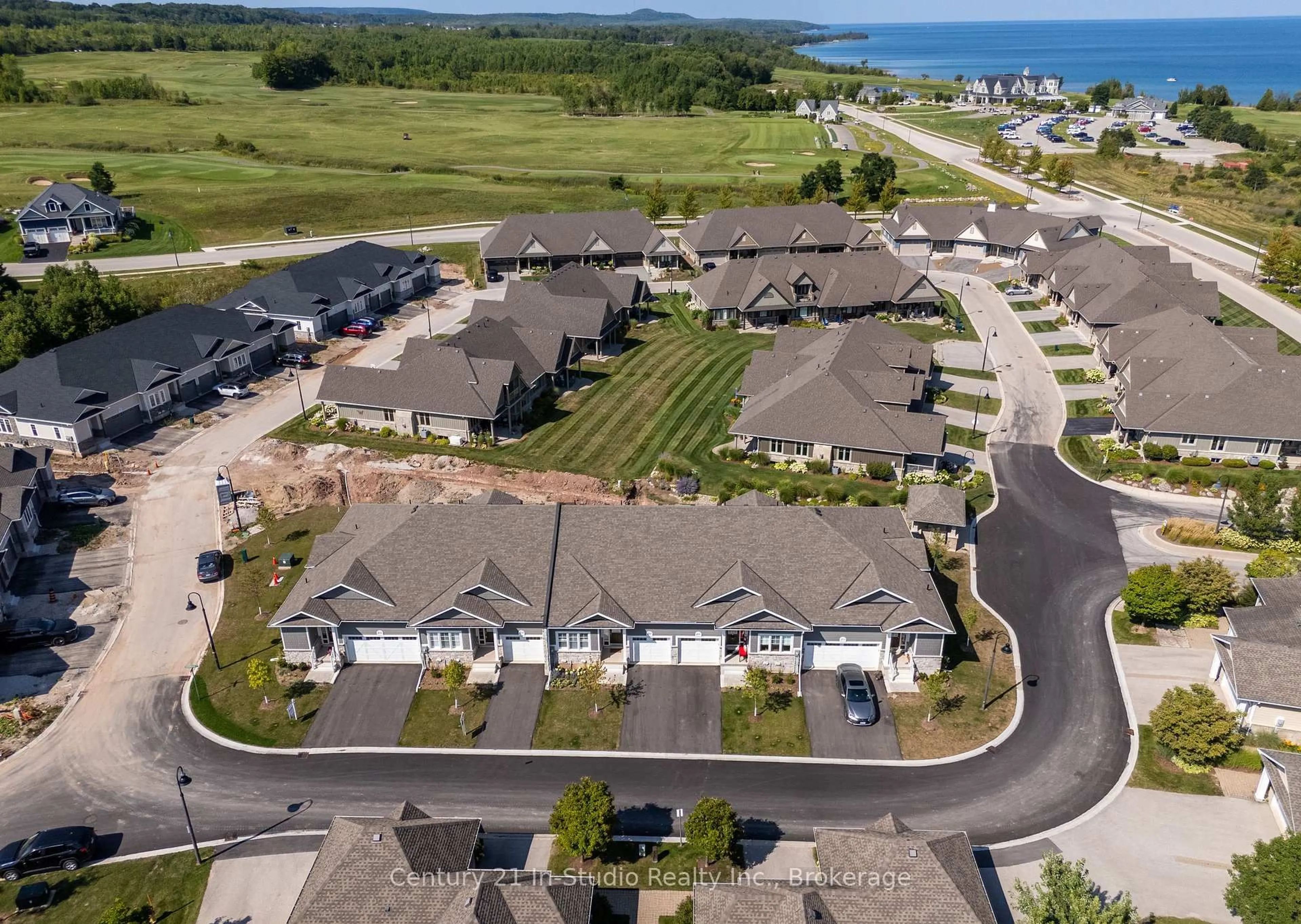 A pic from outside/outdoor area/front of a property/back of a property/a pic from drone, water/lake/river/ocean view for 219 Ironwood Way, Georgian Bluffs Ontario N0H 1S0