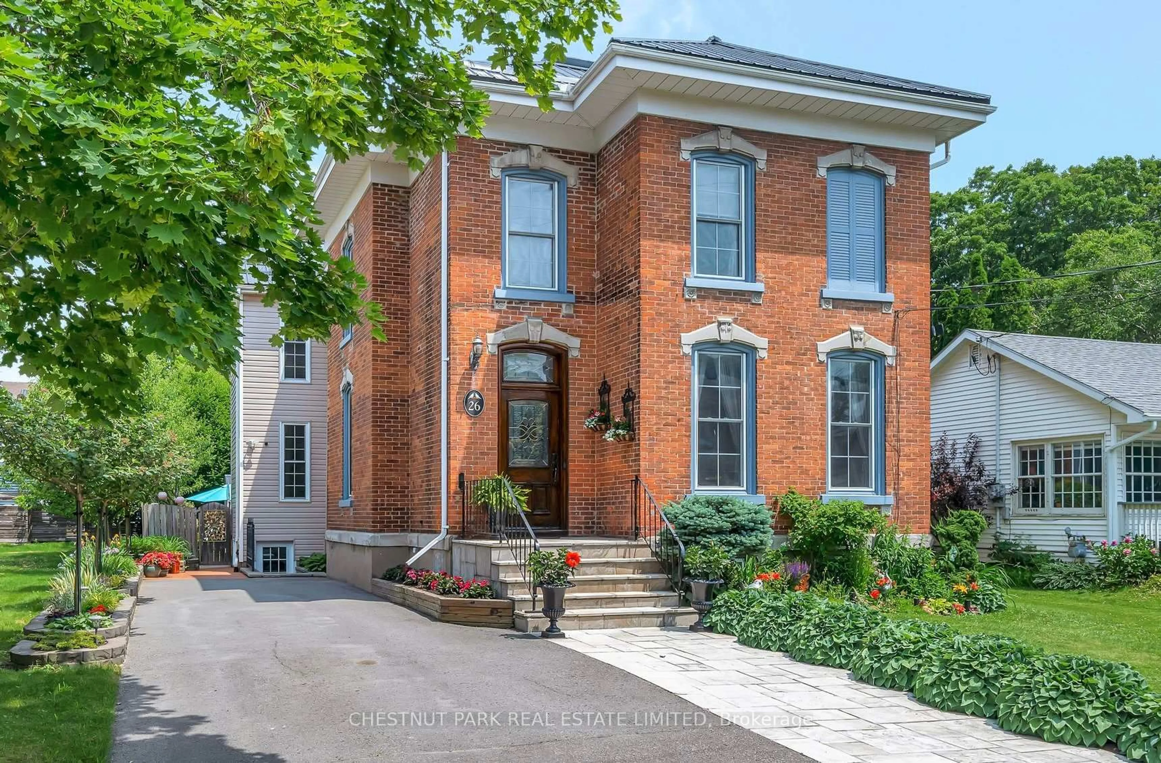 Home with brick exterior material, street for 26 Centre St, Prince Edward County Ontario K0K 2T0