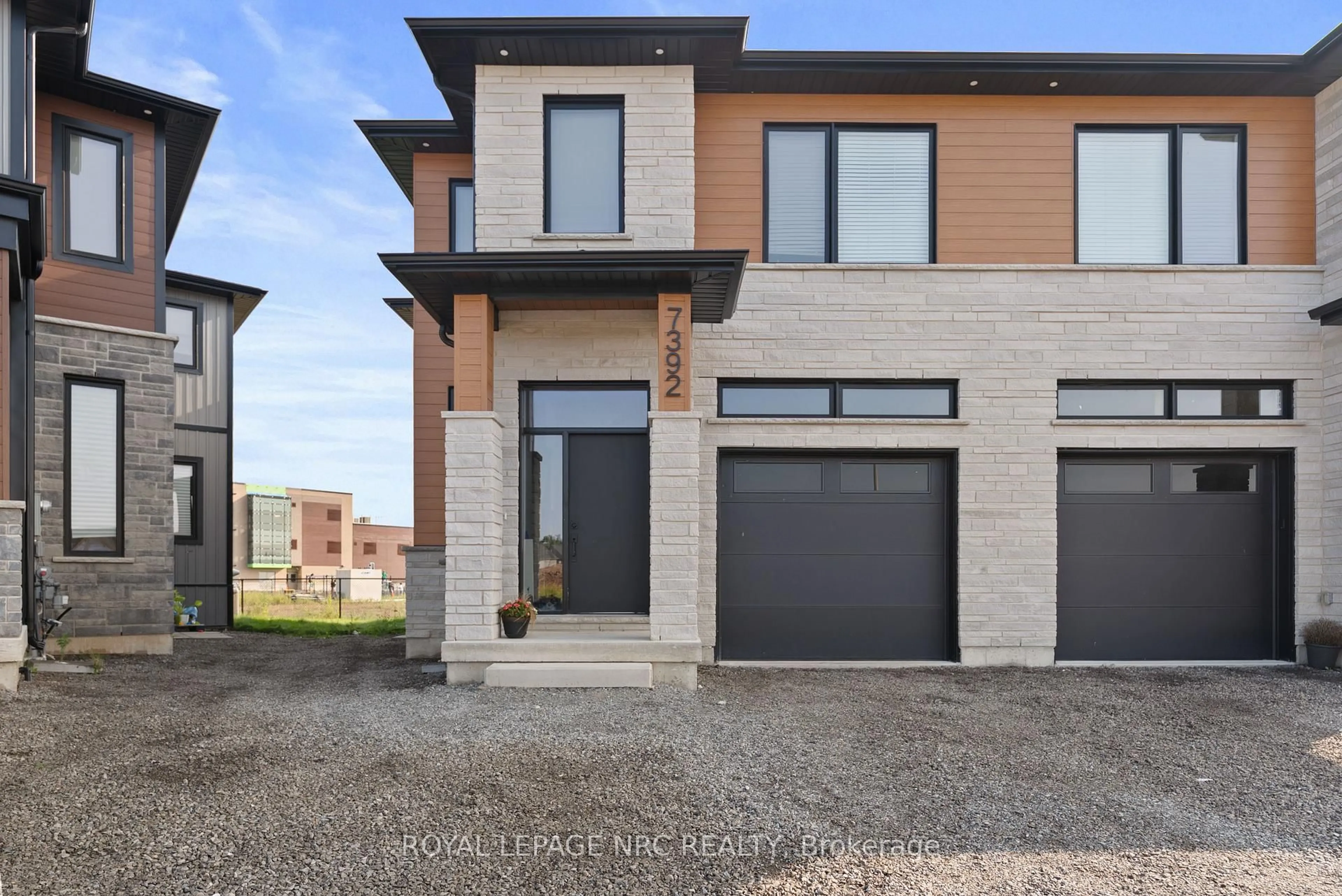 Home with brick exterior material, street for 7392 Splendour Dr, Niagara Falls Ontario L2H 3V8