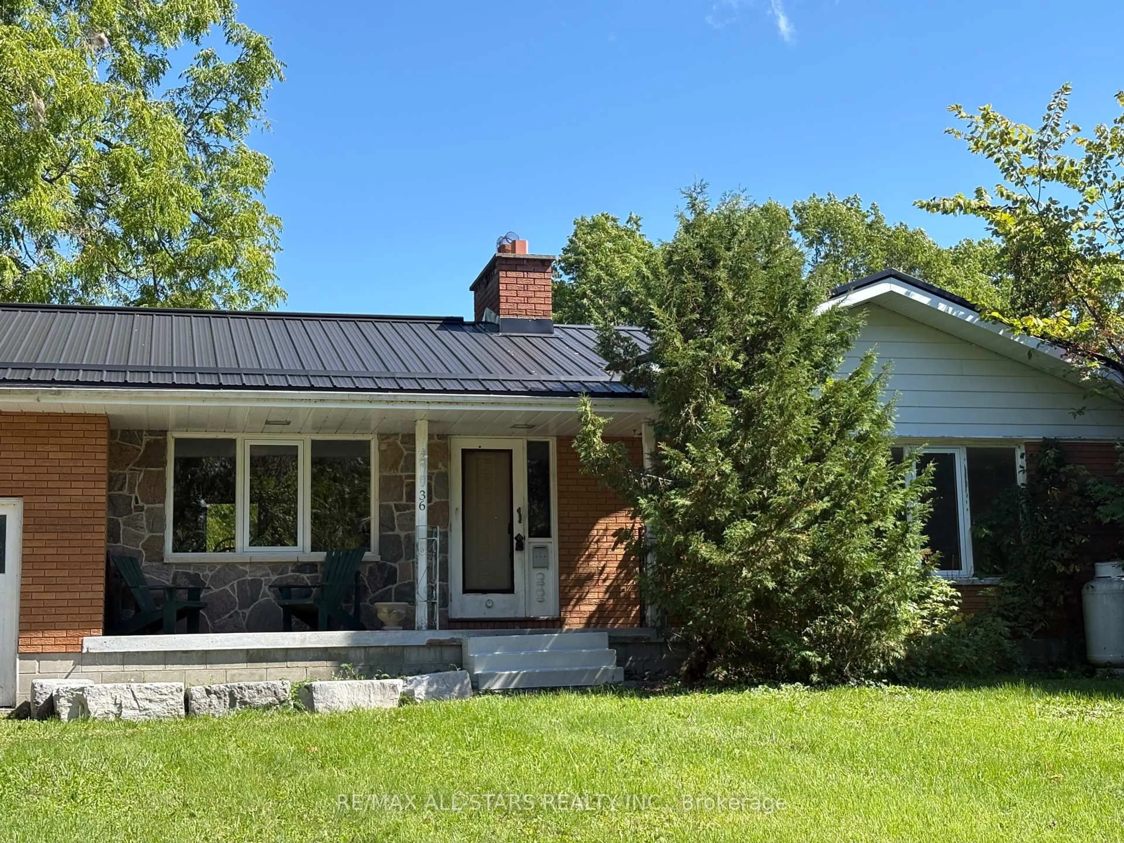 Home with vinyl exterior material, street for 36 Cove Rd, Kawartha Lakes Ontario K0M 1N0