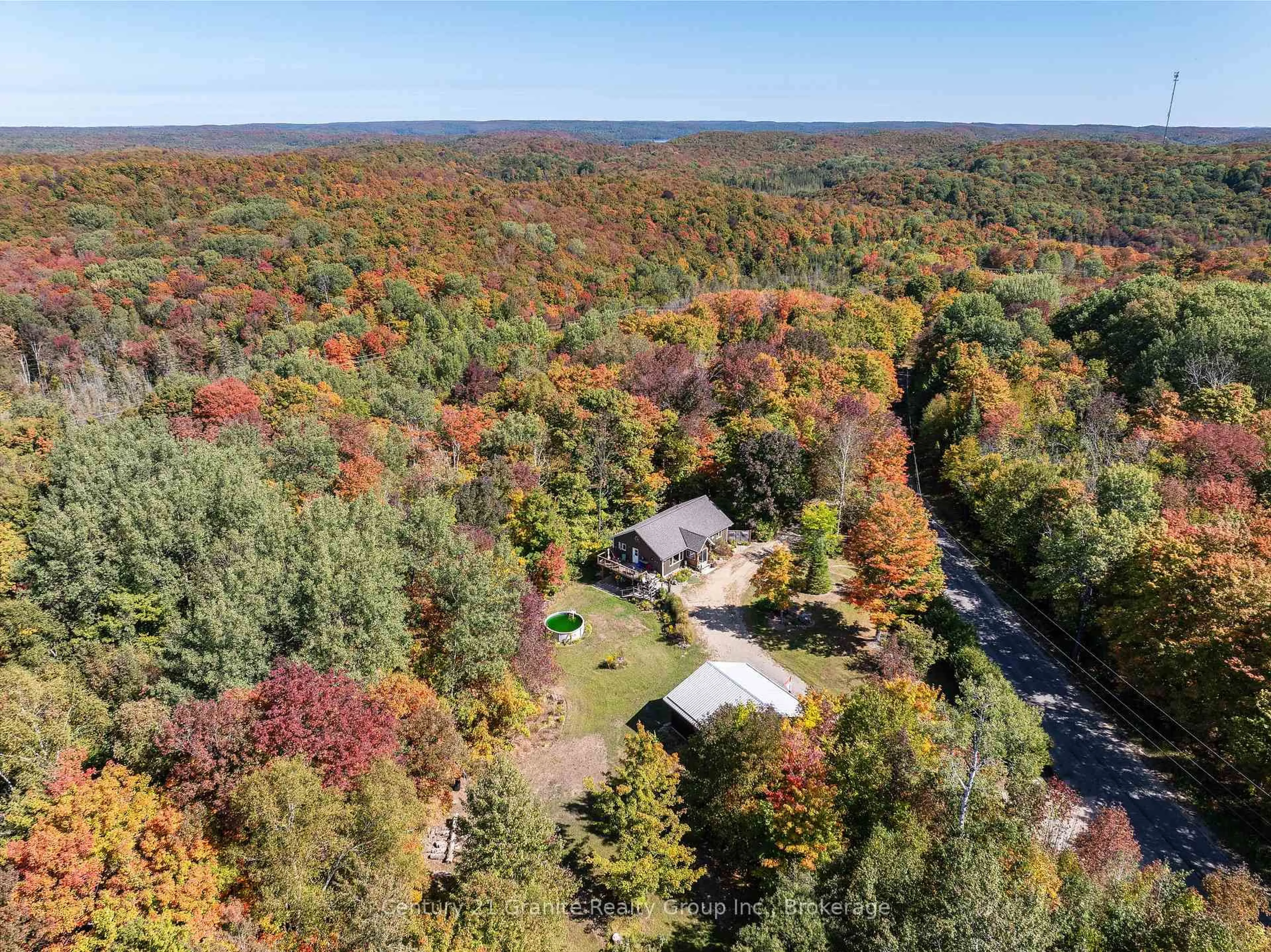A pic from outside/outdoor area/front of a property/back of a property/a pic from drone, forest/trees view for 1263 Burkes Rd, Dysart et al Ontario K0M 1S0