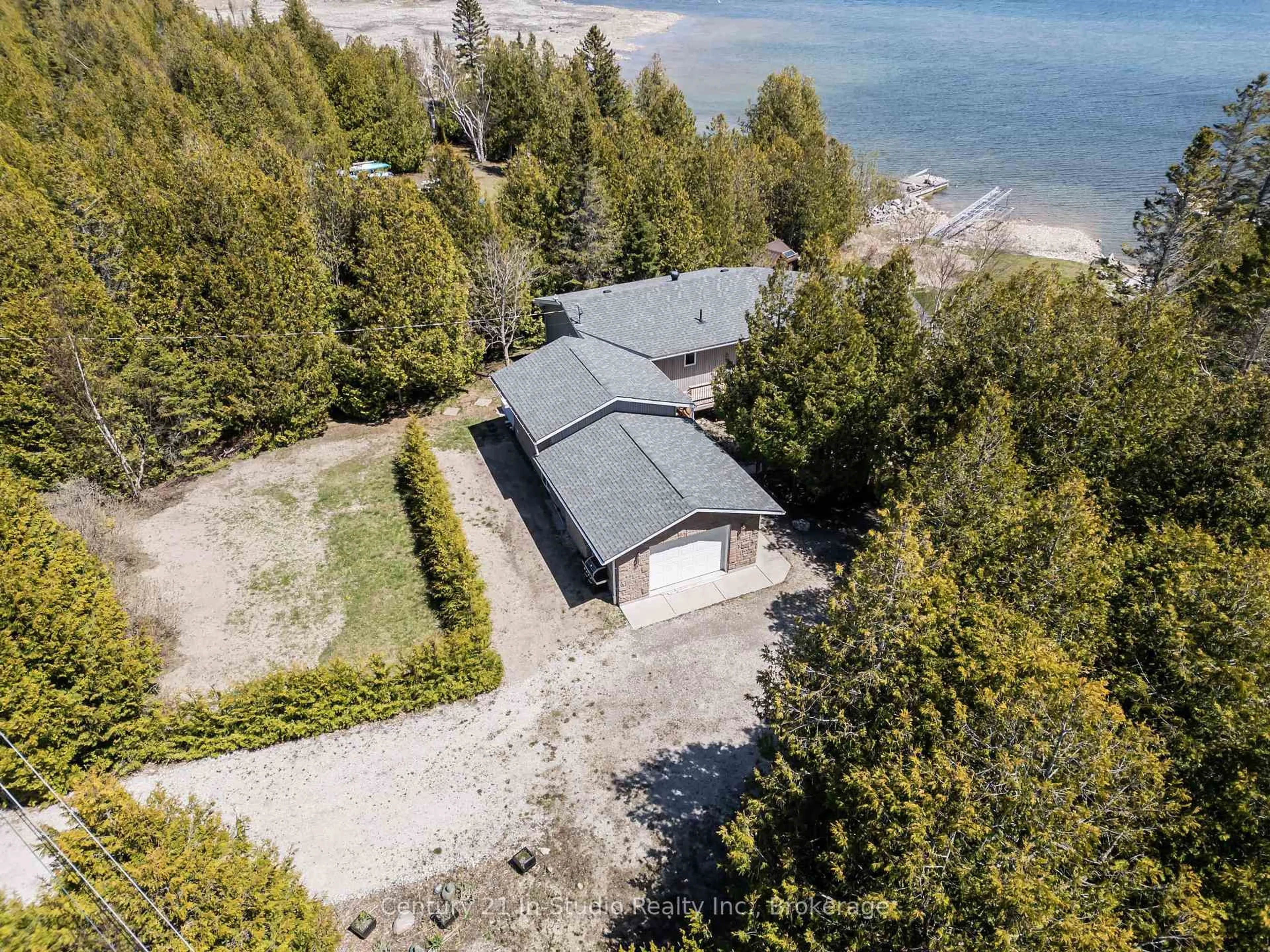 A pic from outside/outdoor area/front of a property/back of a property/a pic from drone, water/lake/river/ocean view for 119 Pine Tree Harbour Rd, Northern Bruce Peninsula Ontario N0H 1Z0