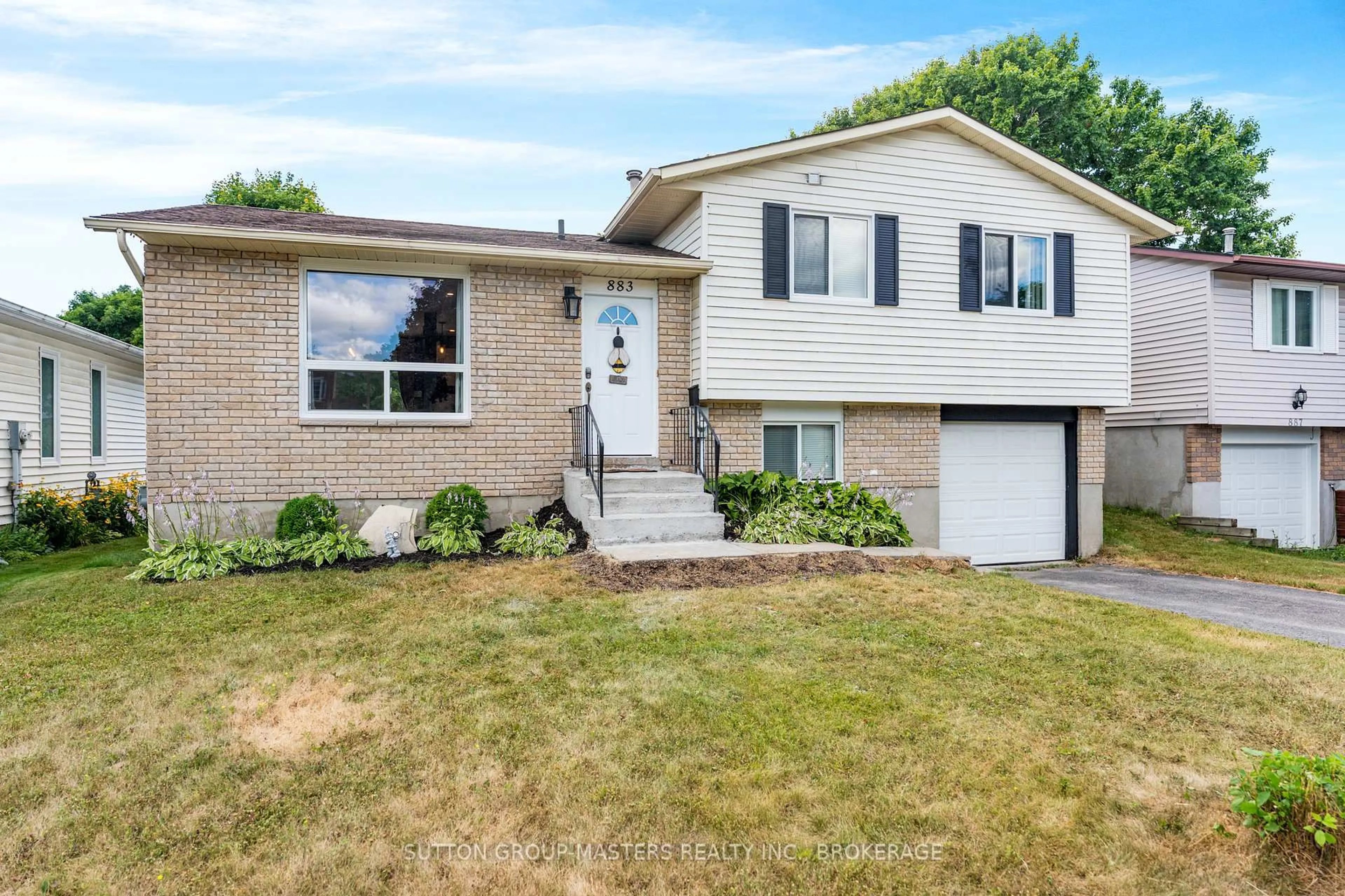 Home with brick exterior material, street for 883 Old Colony Rd, Kingston Ontario K7P 1S1