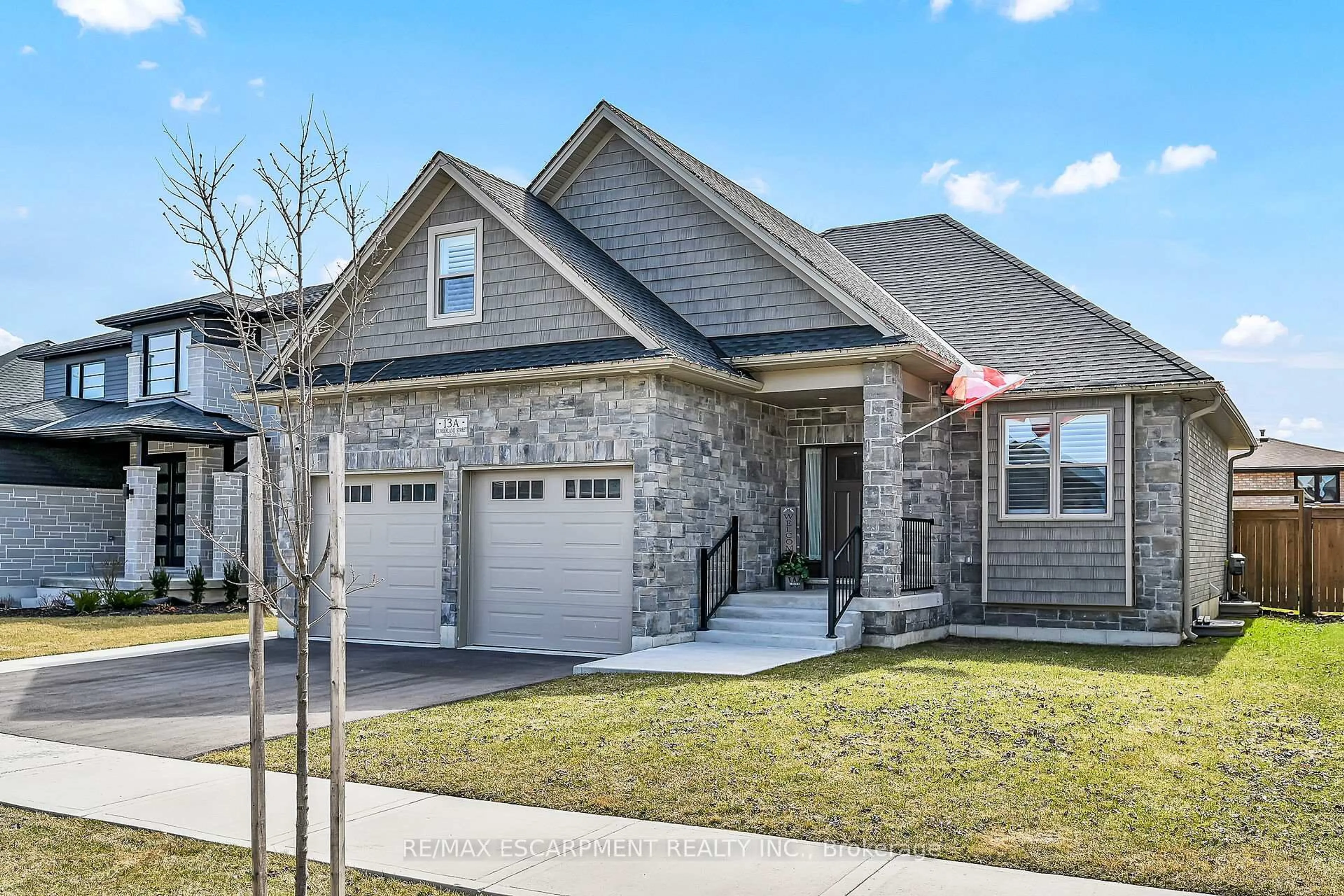 Home with brick exterior material, street for 13A Cumberland St, Brantford Ontario N3S 7J6