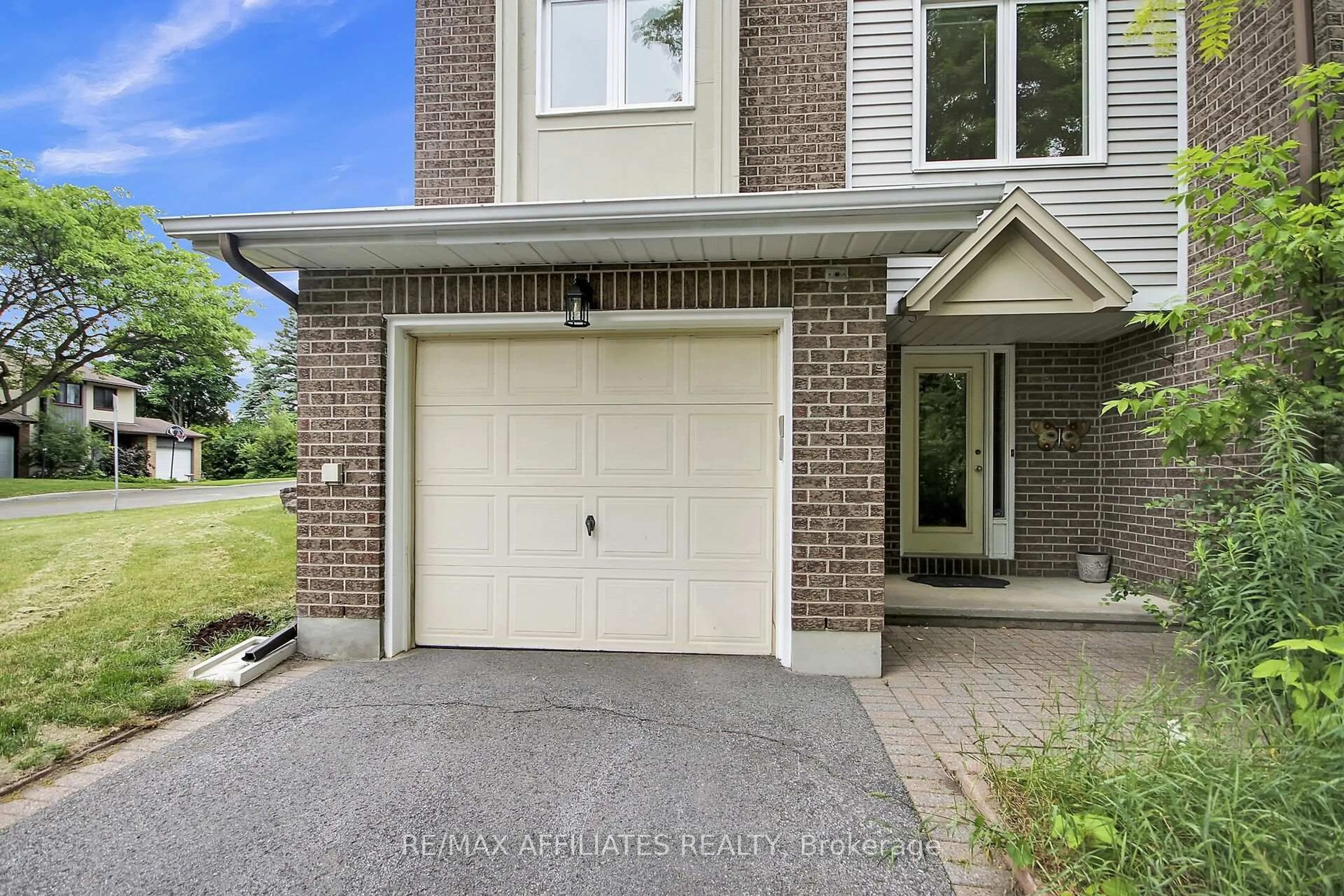 Home with brick exterior material, street for 15 Vanessa Terr #F, Barrhaven Ontario K2J 3K5