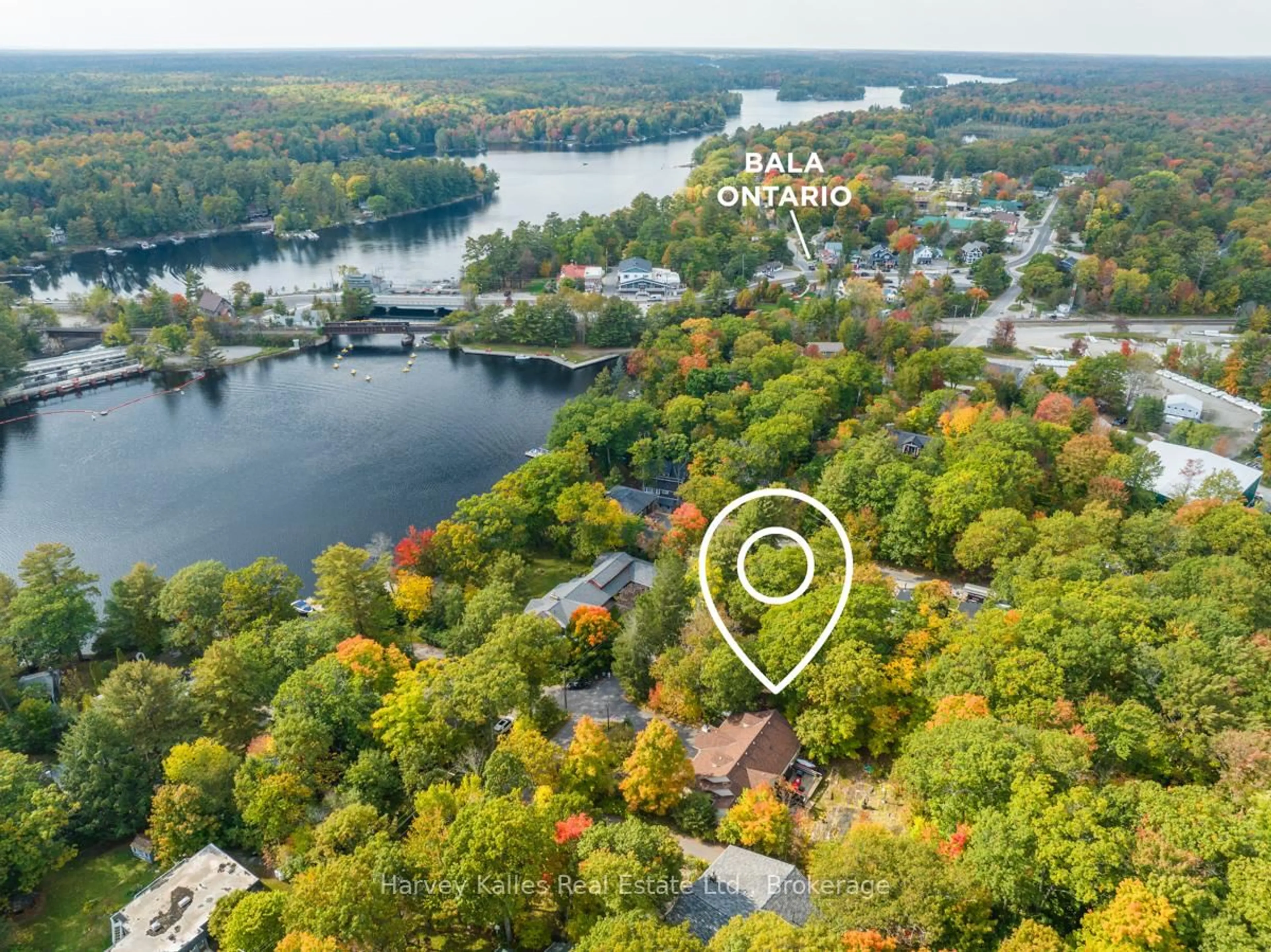 A pic from outside/outdoor area/front of a property/back of a property/a pic from drone, water/lake/river/ocean view for 1039 Gordon St St, Muskoka Lakes Ontario P0C 1A0