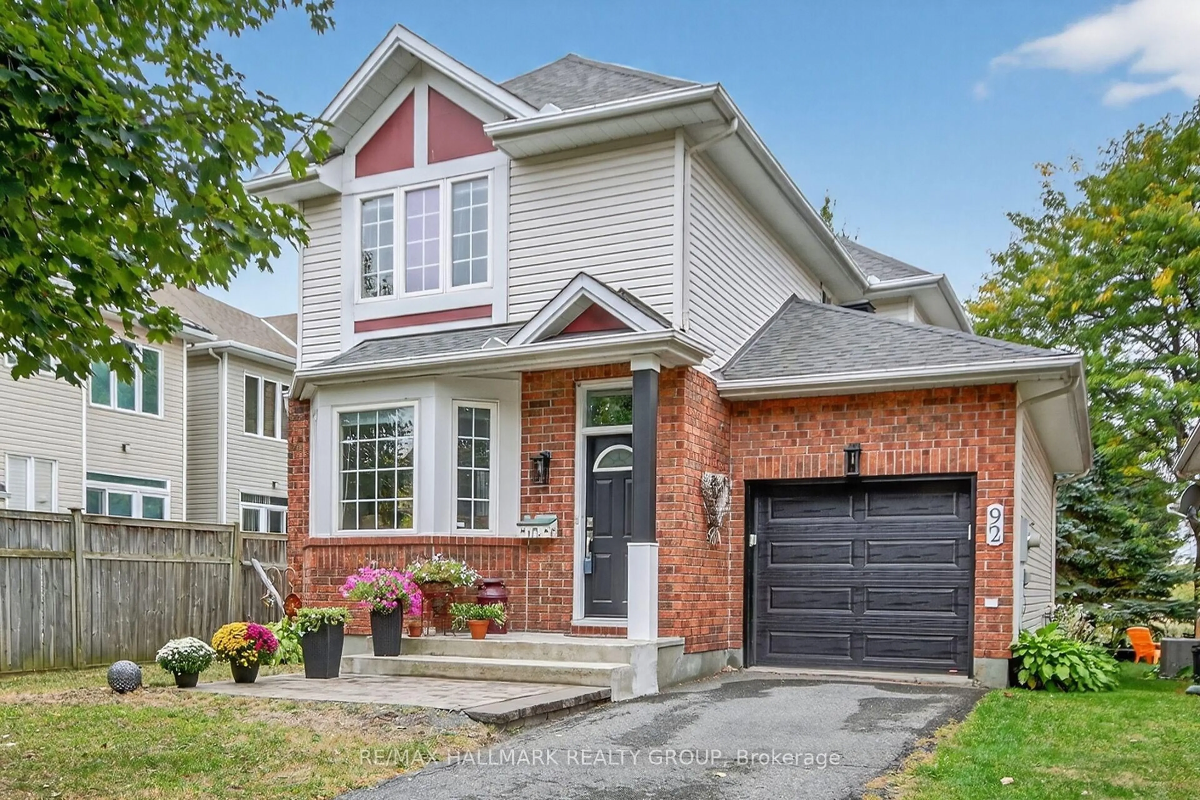 Home with brick exterior material, street for 92 Stonemeadow Dr, Kanata Ontario K2M 2M3
