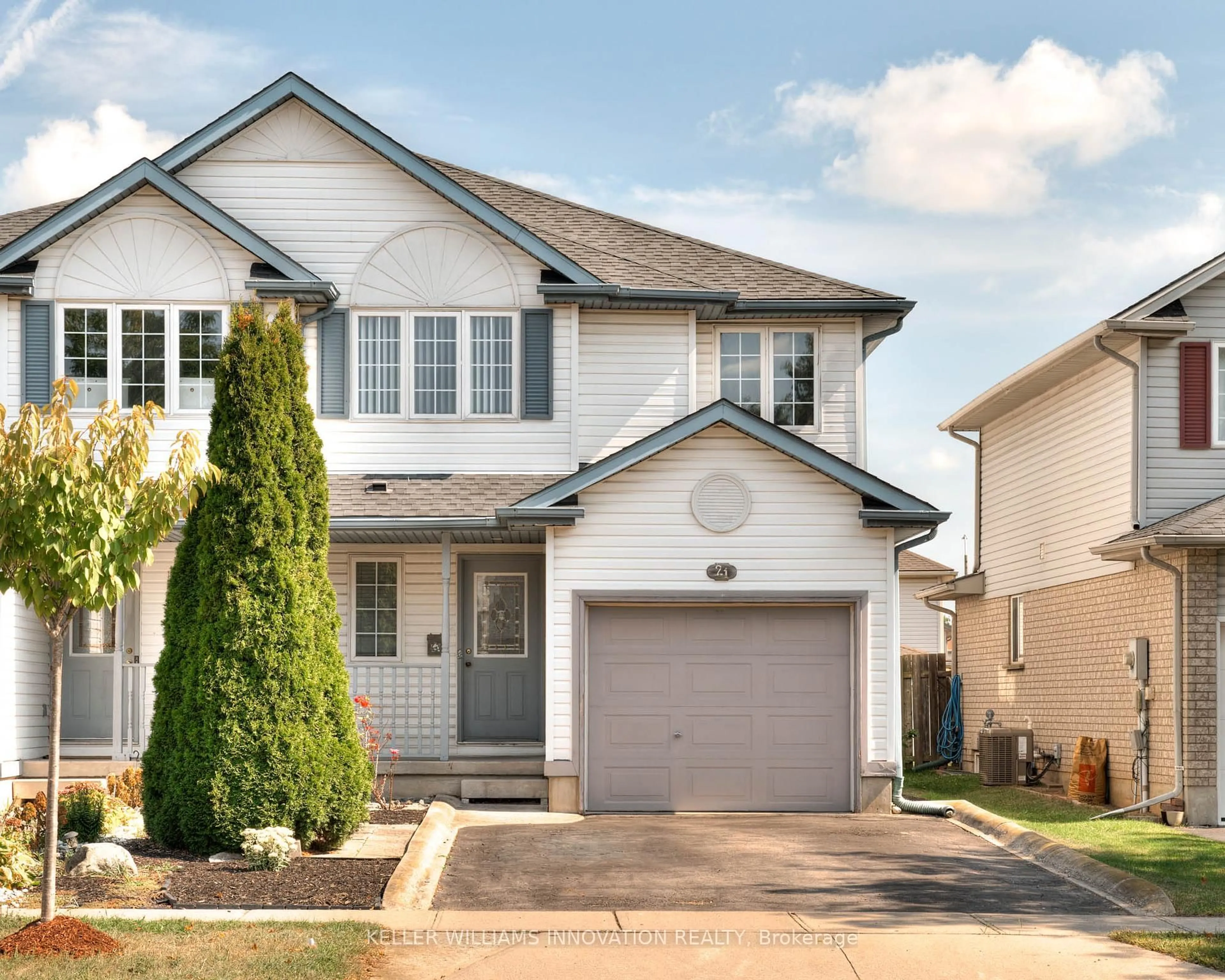 Home with vinyl exterior material, street for 21 Whittaker Cres, Cambridge Ontario N1T 1Z4