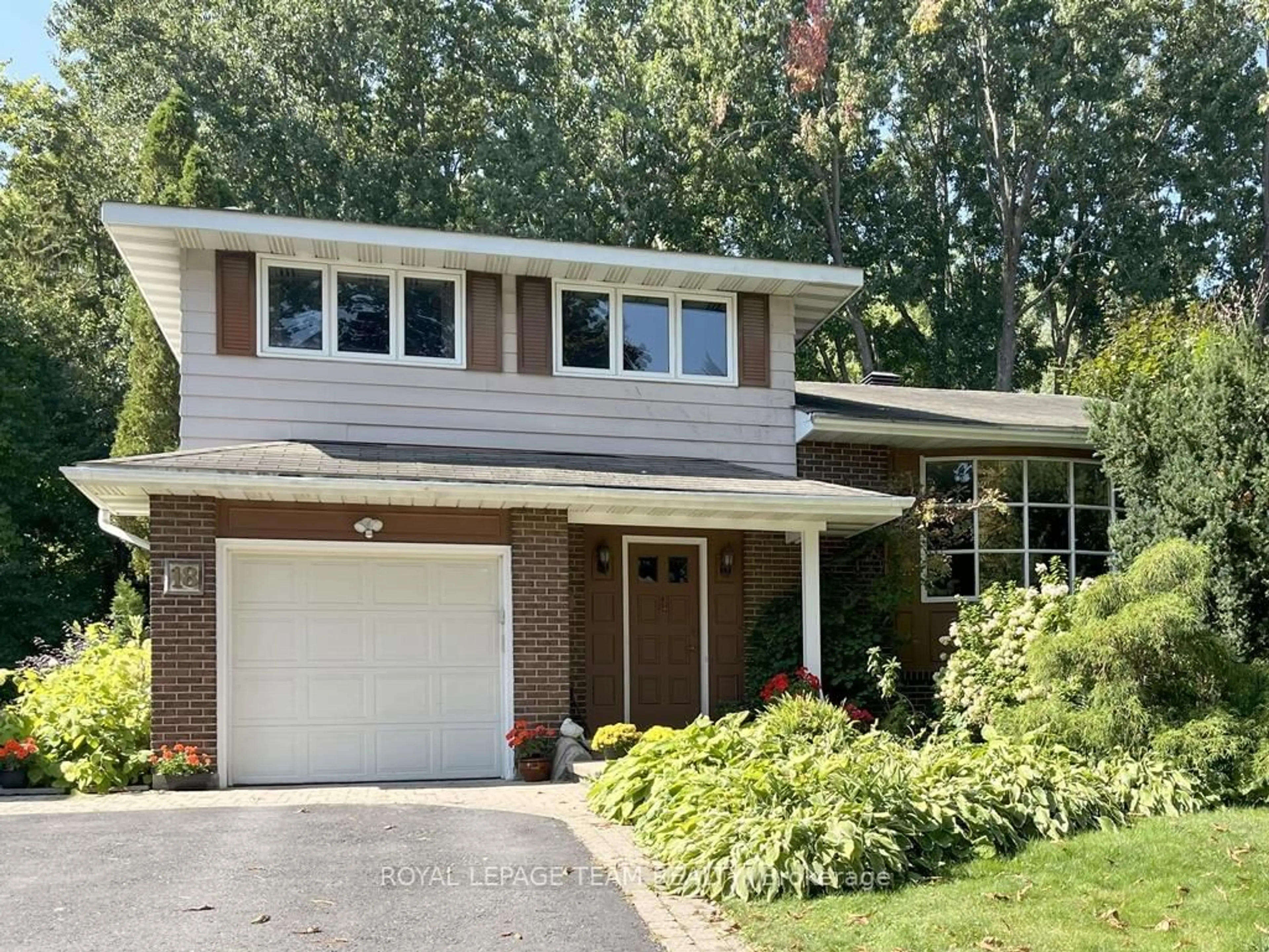 Home with brick exterior material, street for 18 Diceman Cres, Ottawa Ontario K1B 3Y3