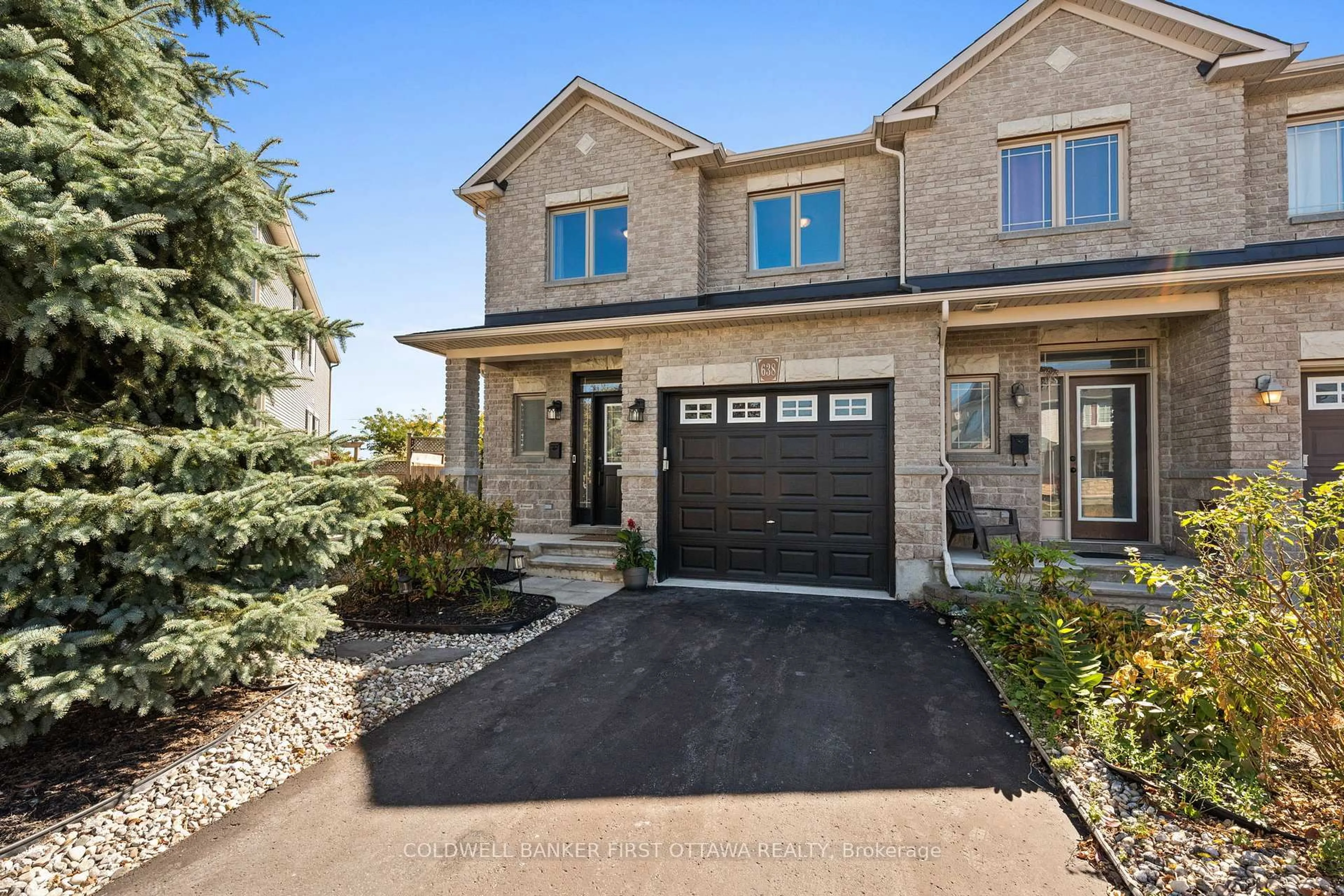 Home with brick exterior material, street for 638 Pepperville Cres, Ottawa Ontario K2M 0E8