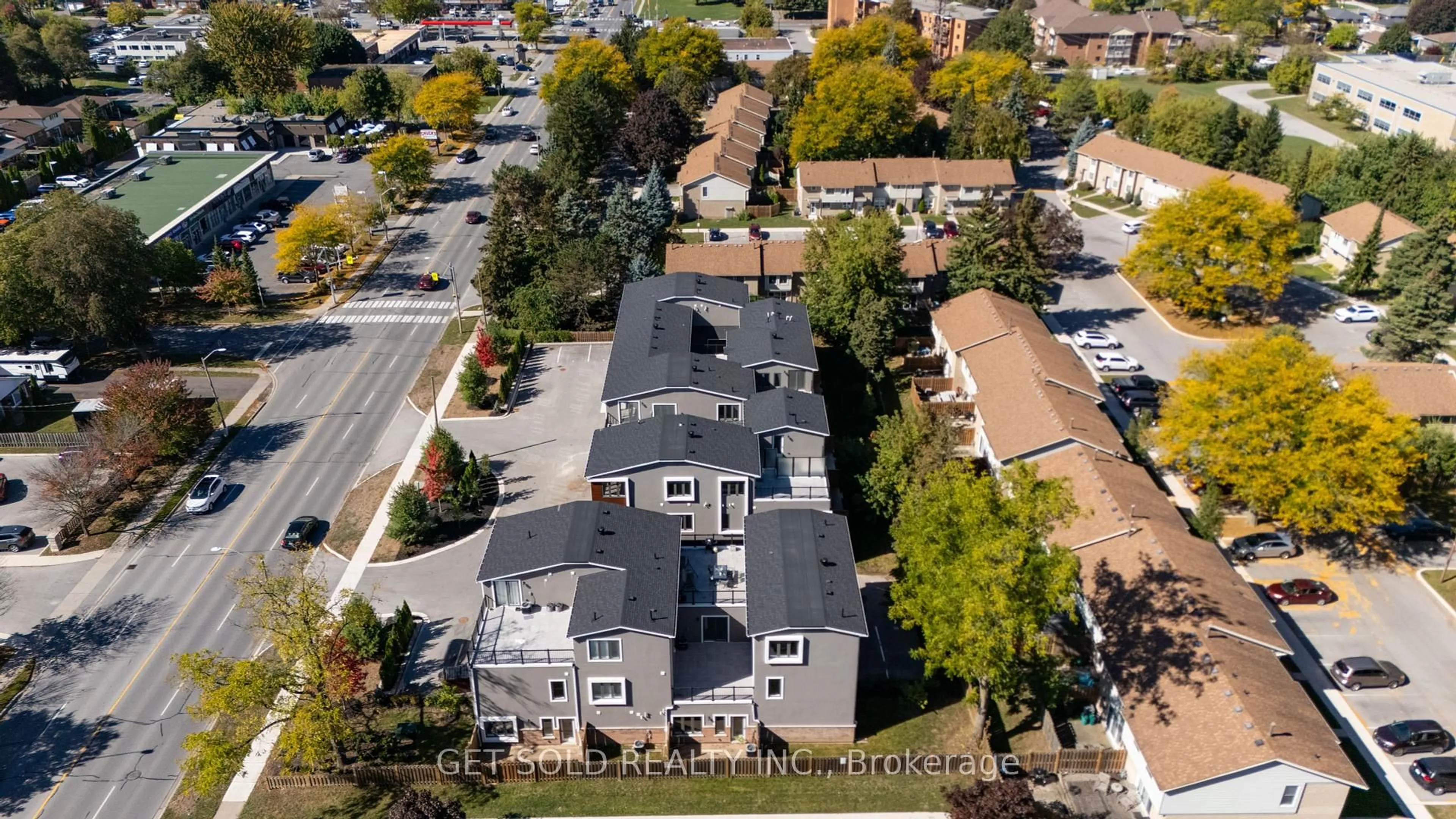 A pic from outside/outdoor area/front of a property/back of a property/a pic from drone, street for 6701 Thorold Stone Rd #13, Niagara Falls Ontario L2J 1B3