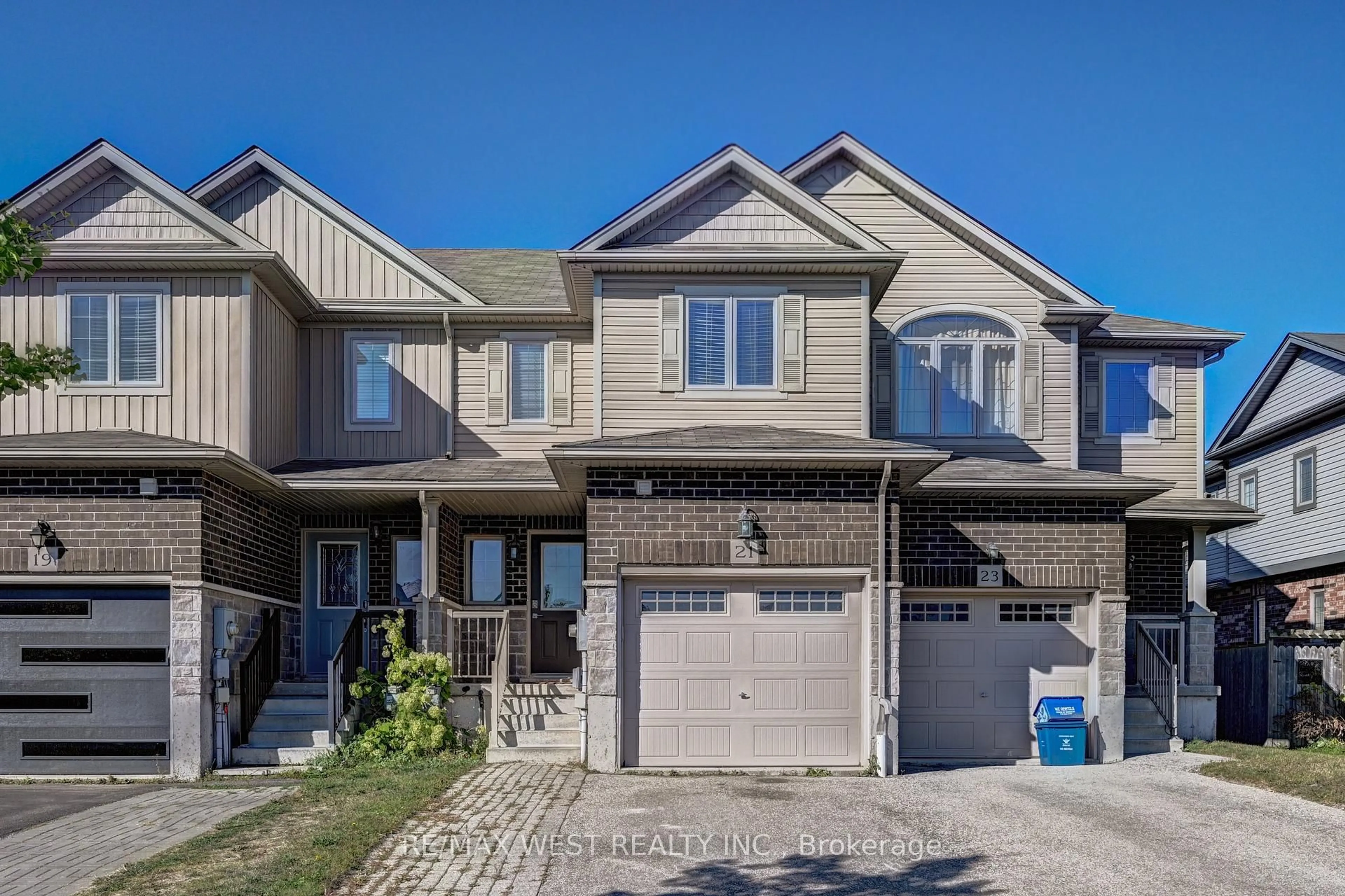 Home with brick exterior material, street for 21 Machado St, Kitchener Ontario N2R 0C1
