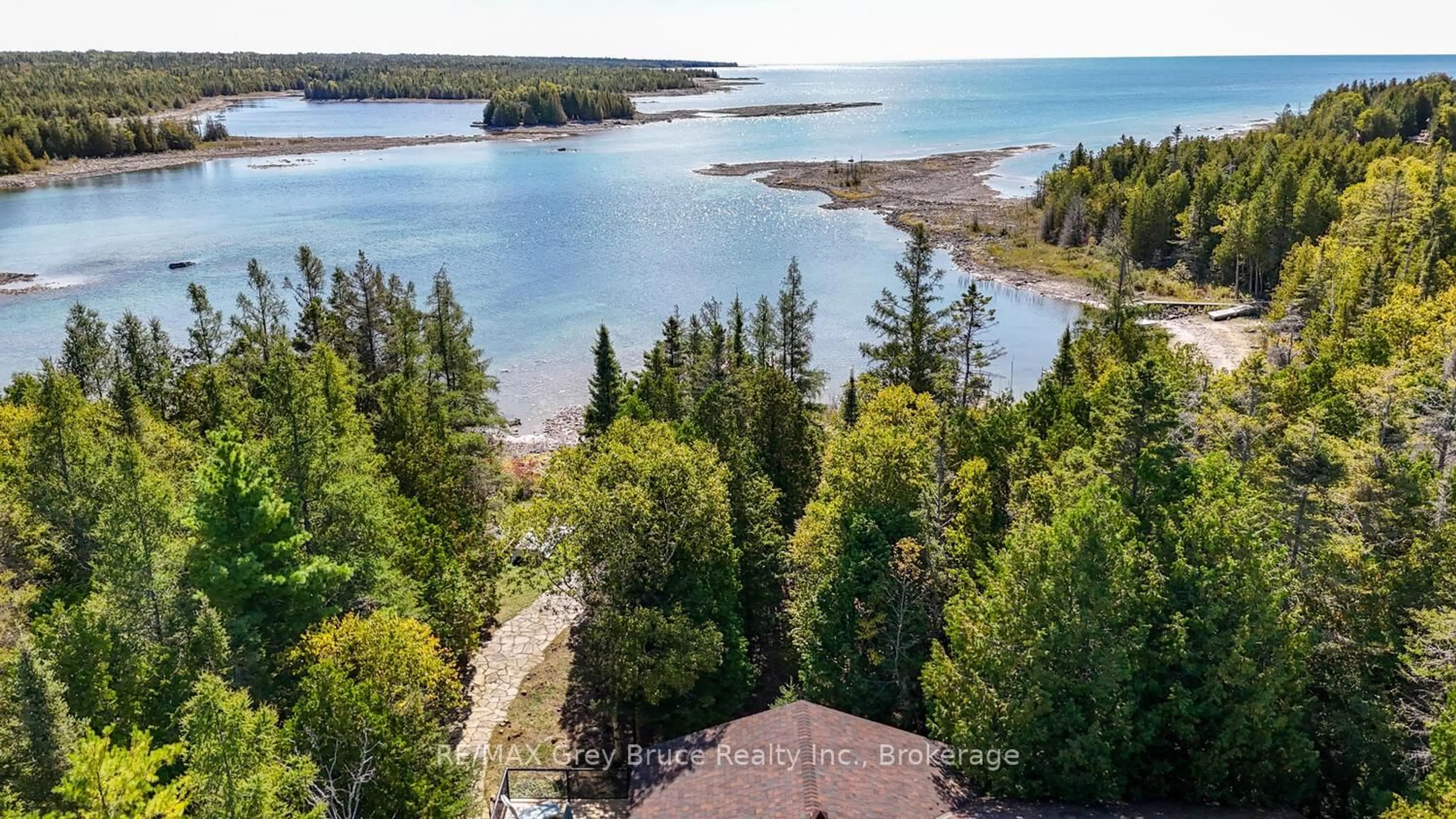 A pic from outside/outdoor area/front of a property/back of a property/a pic from drone, water/lake/river/ocean view for 27 Silverside Point Dr, Northern Bruce Peninsula Ontario N0H 1Z0
