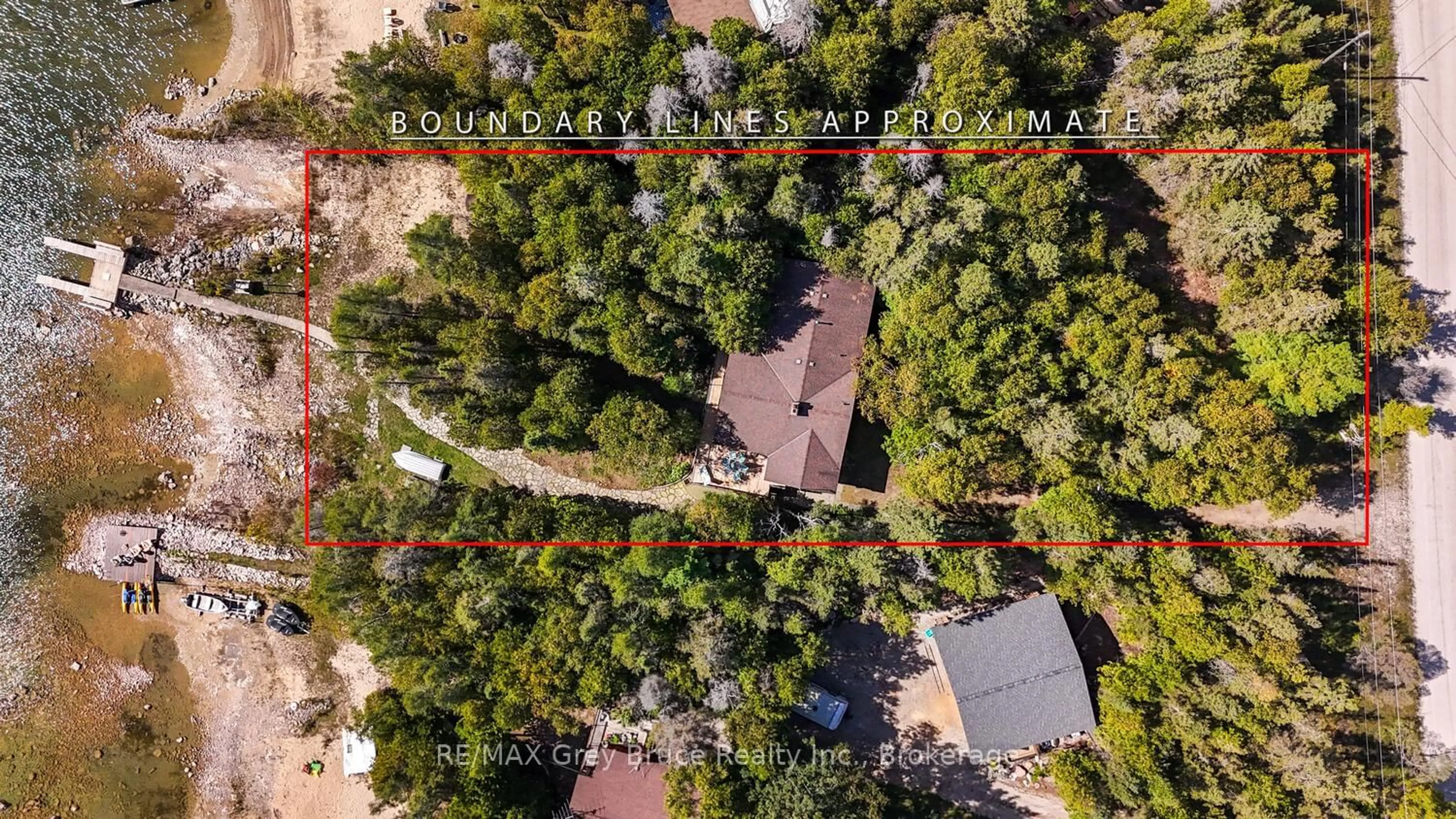 A pic from outside/outdoor area/front of a property/back of a property/a pic from drone, forest/trees view for 27 Silverside Point Dr, Northern Bruce Peninsula Ontario N0H 1Z0
