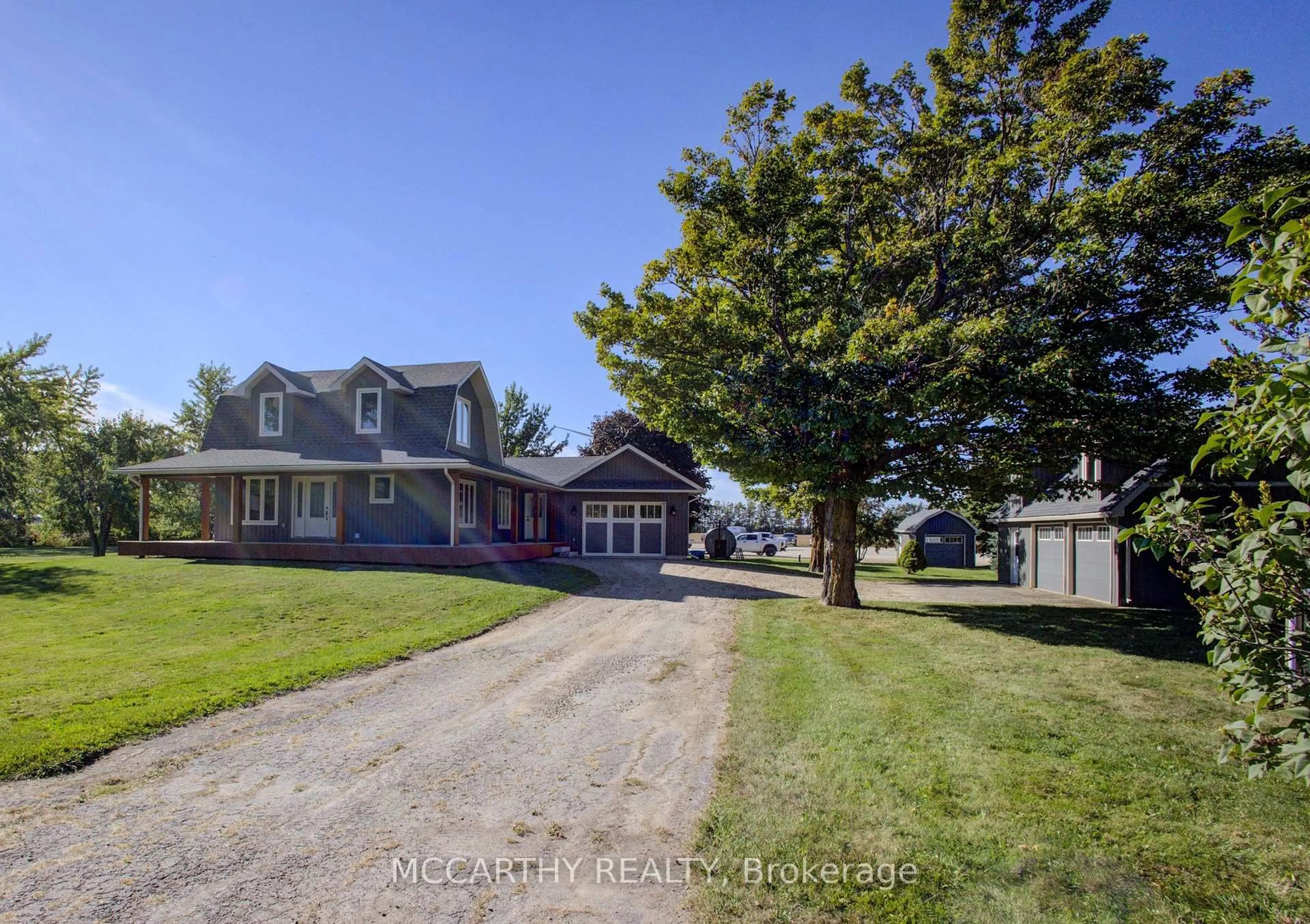 A pic from outside/outdoor area/front of a property/back of a property/a pic from drone, street for 582335 County Road 17 St, Melancthon Ontario L9V 2L6