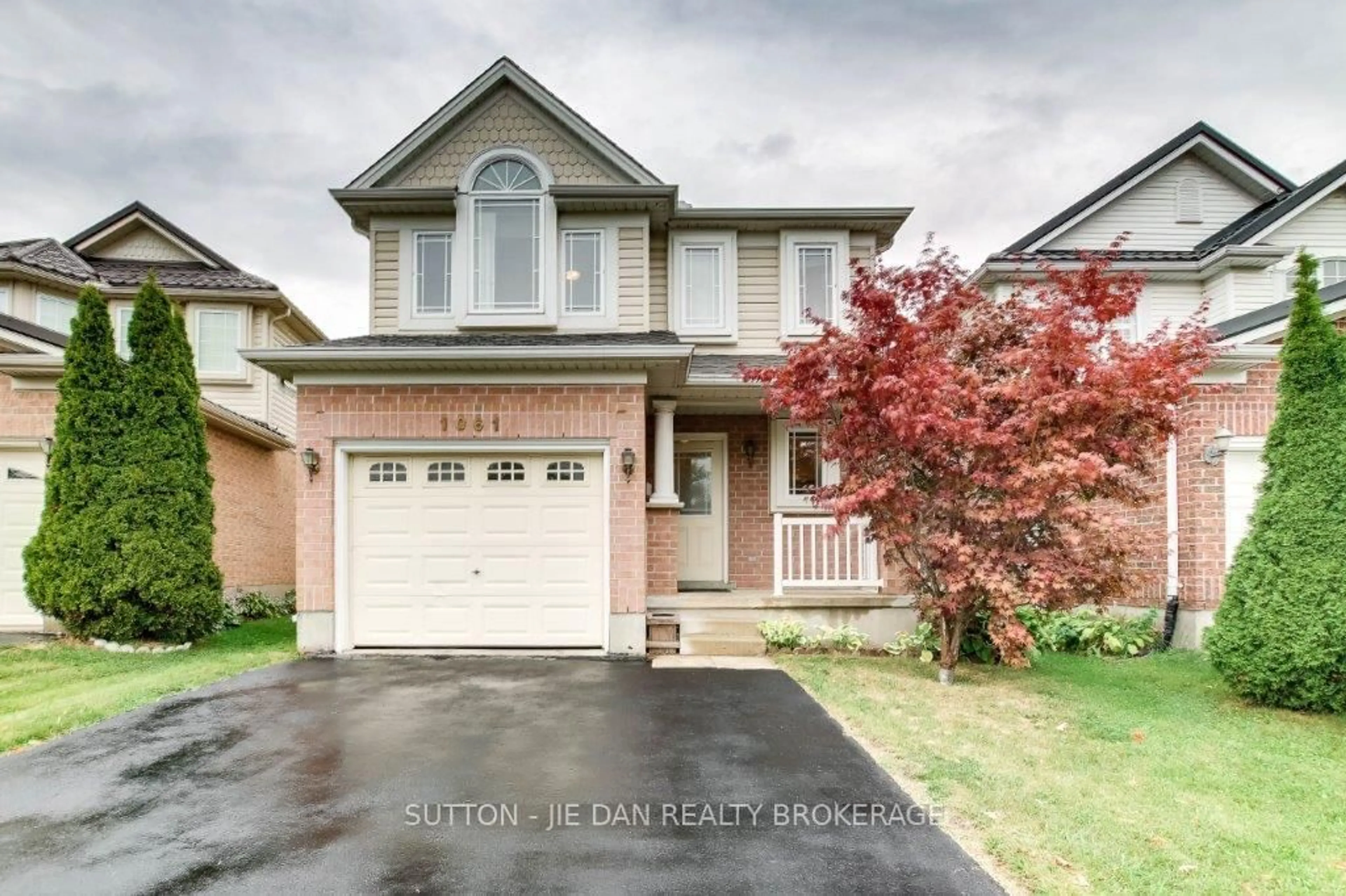 Home with brick exterior material, street for 1061 Crosscreek Cres, London East Ontario N5Y 6K9