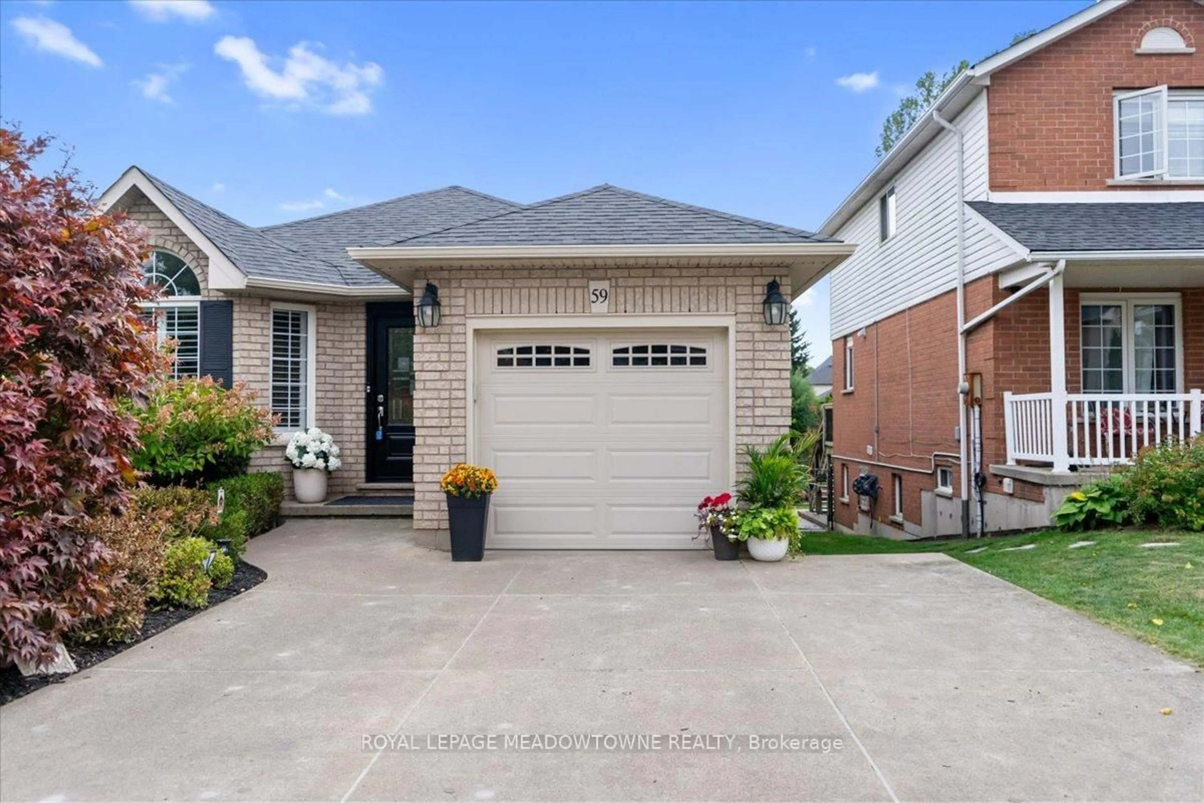 Home with brick exterior material, street for 59 Massena Dr, Hamilton Ontario L9B 2J3