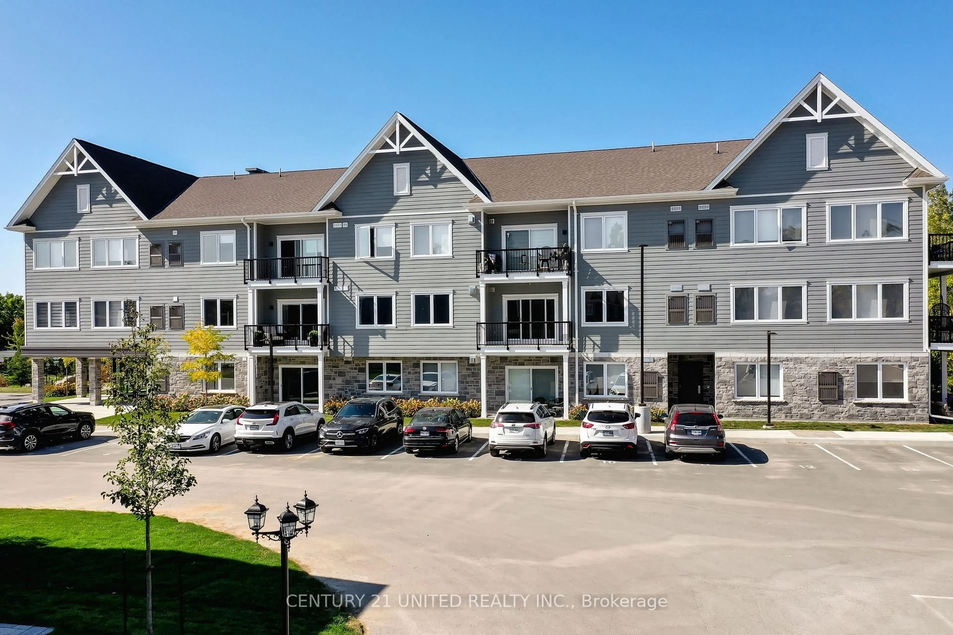A pic from outside/outdoor area/front of a property/back of a property/a pic from drone, unknown for 19 Hampton Lane #202, Selwyn Ontario K0L 2H0