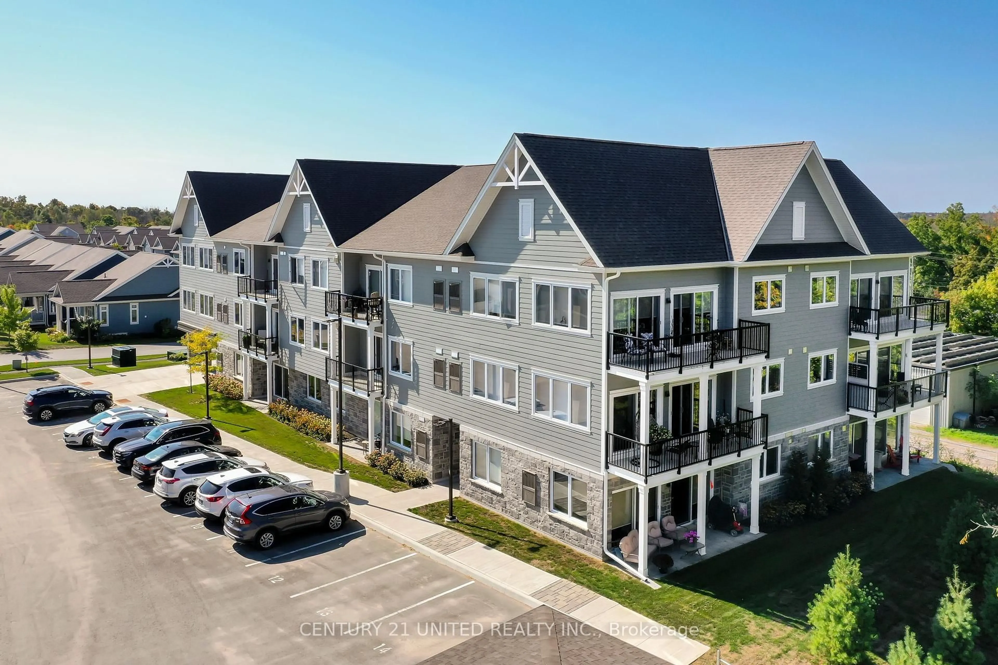 A pic from outside/outdoor area/front of a property/back of a property/a pic from drone, unknown for 19 Hampton Lane #202, Selwyn Ontario K0L 2H0