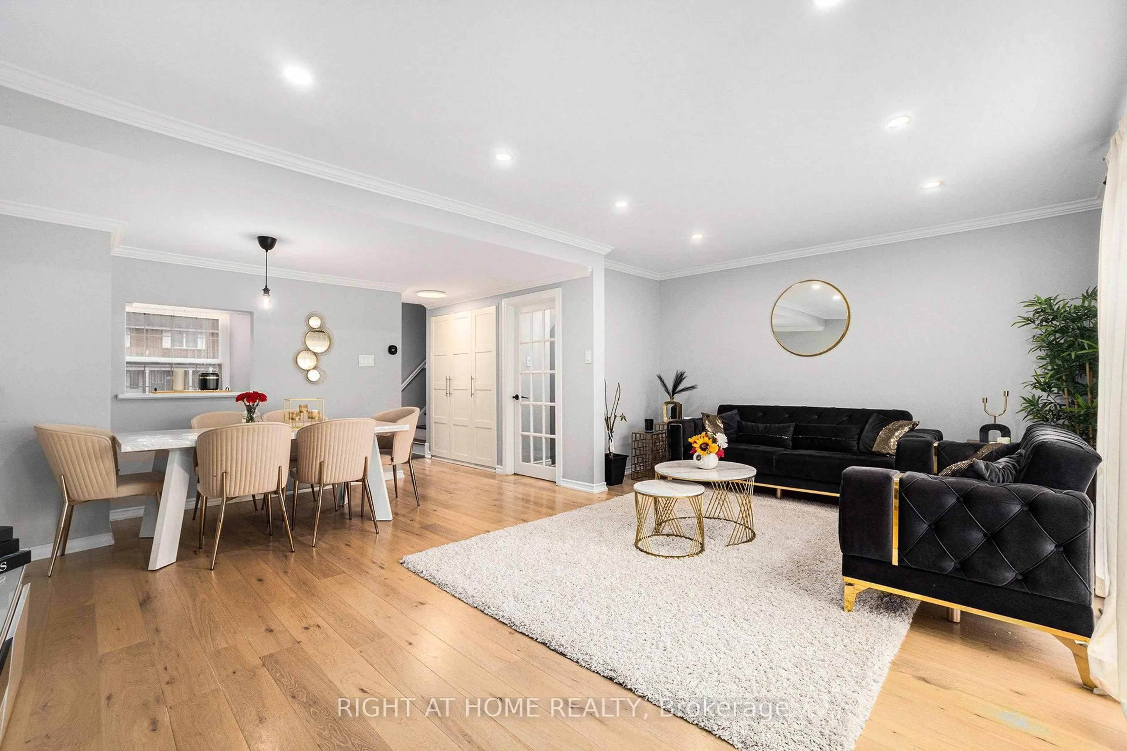Living room with furniture, wood/laminate floor for 3 Monterey Dr, Ottawa Ontario K2H 7A9