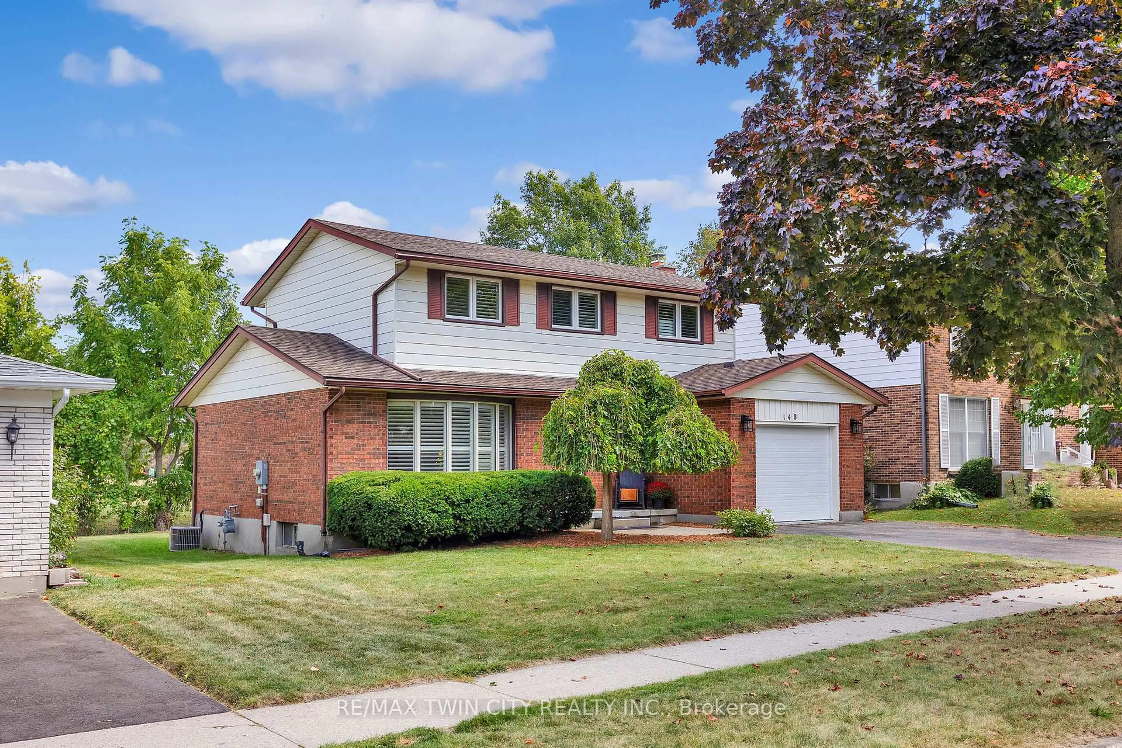 Home with brick exterior material, street for 148 Candlewood Cres, Waterloo Ontario N2L 5T4