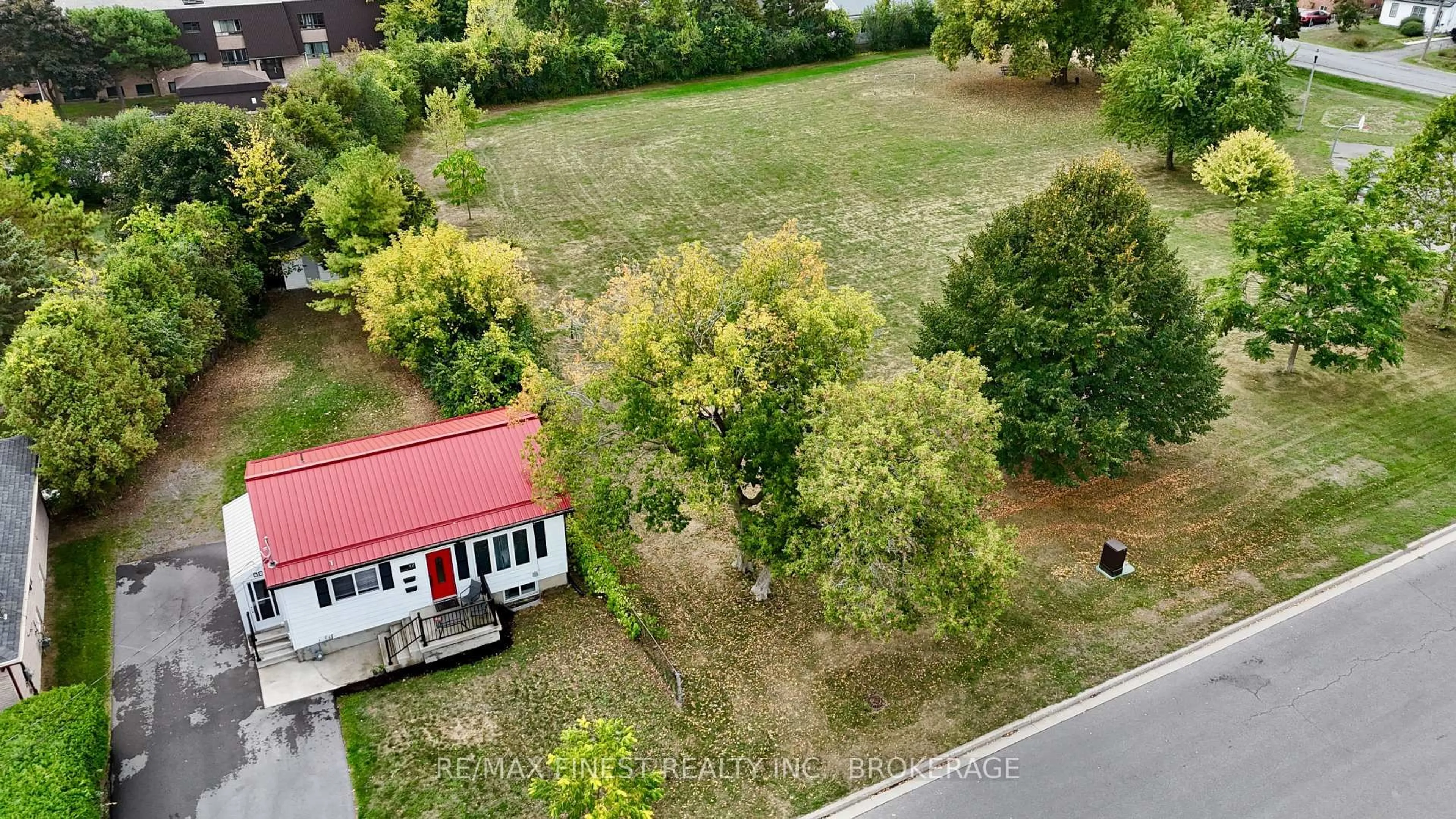 A pic from outside/outdoor area/front of a property/back of a property/a pic from drone, forest/trees view for 42 Drennan St, Kingston Ontario K7K 2S1
