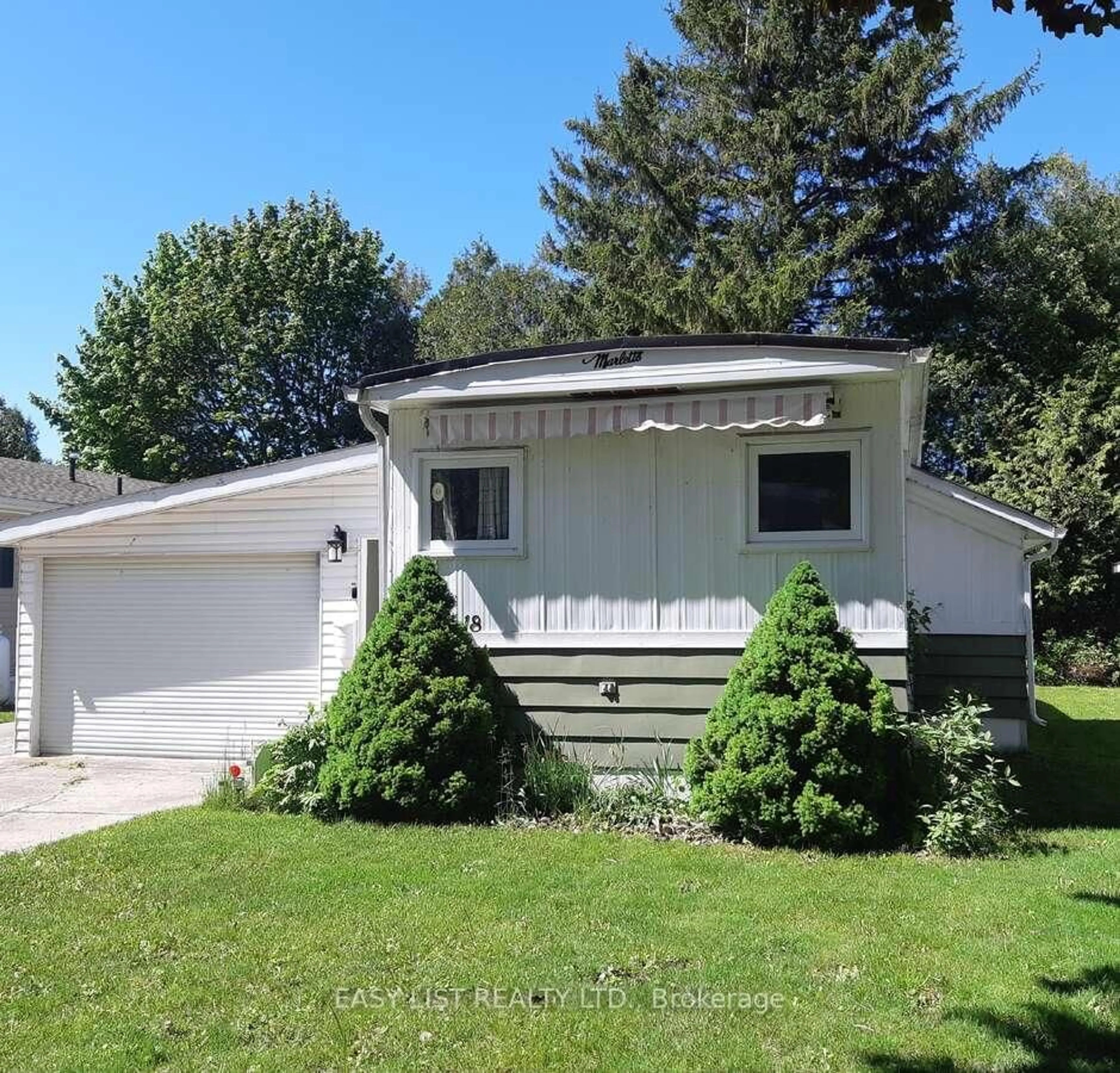 Home with vinyl exterior material, street for 18 Sutton Dr, Ashfield-Colborne-Wawanosh Ontario N7A 3Y3