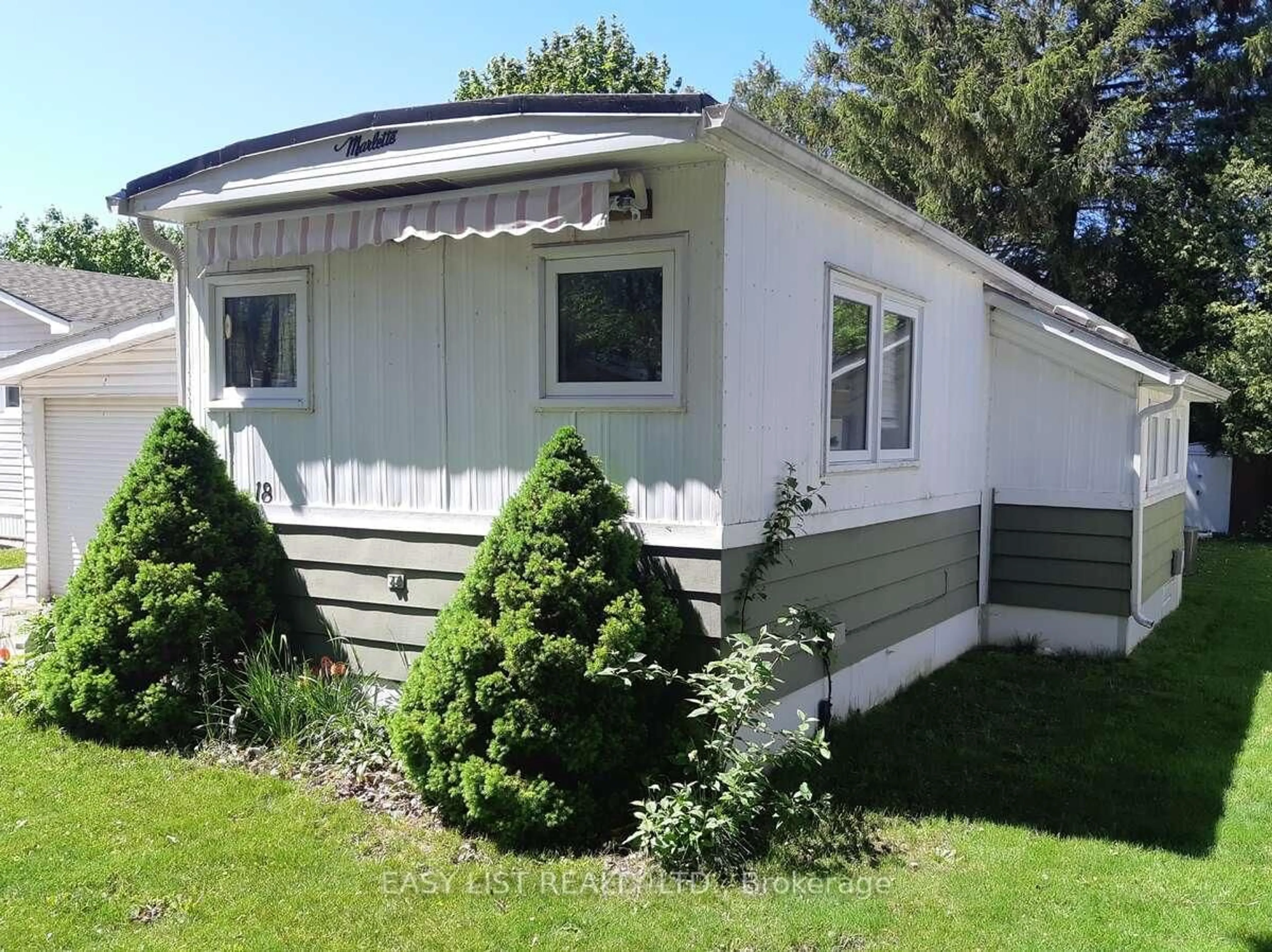 Home with vinyl exterior material, street for 18 Sutton Dr, Ashfield-Colborne-Wawanosh Ontario N7A 3Y3