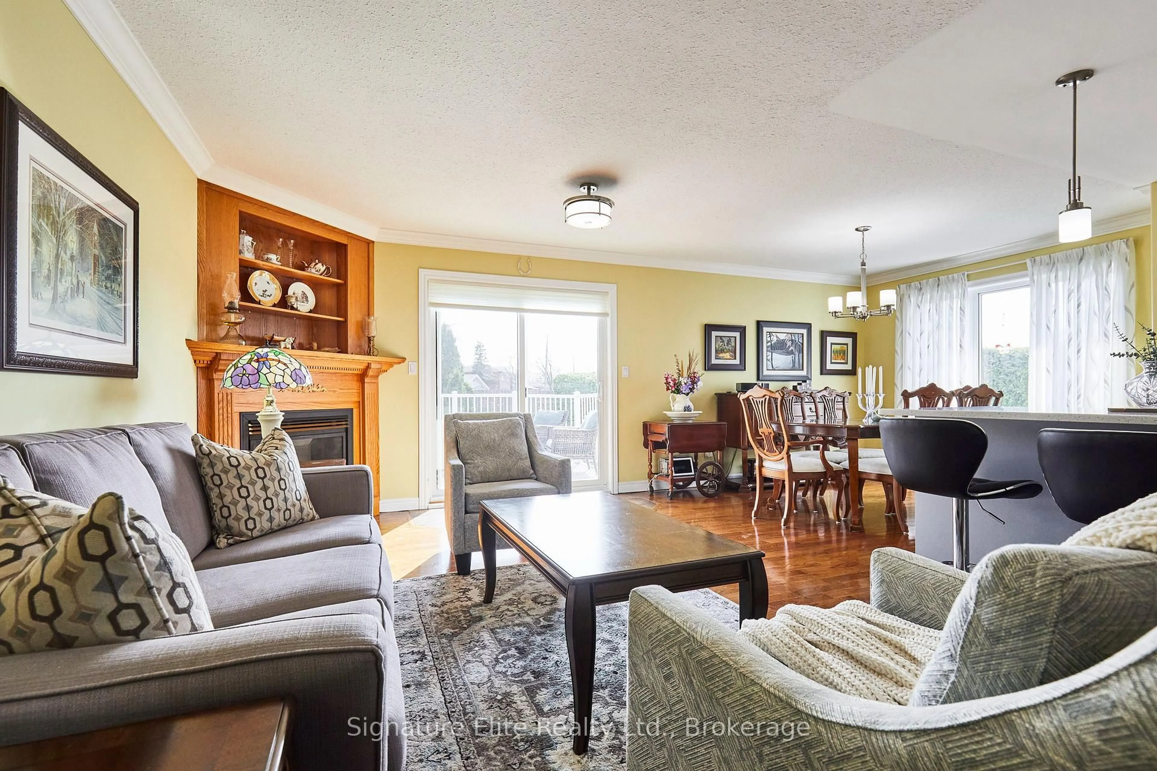 Living room with furniture, wood/laminate floor for 19 Lori Blvd, Kawartha Lakes Ontario K9V 6B6