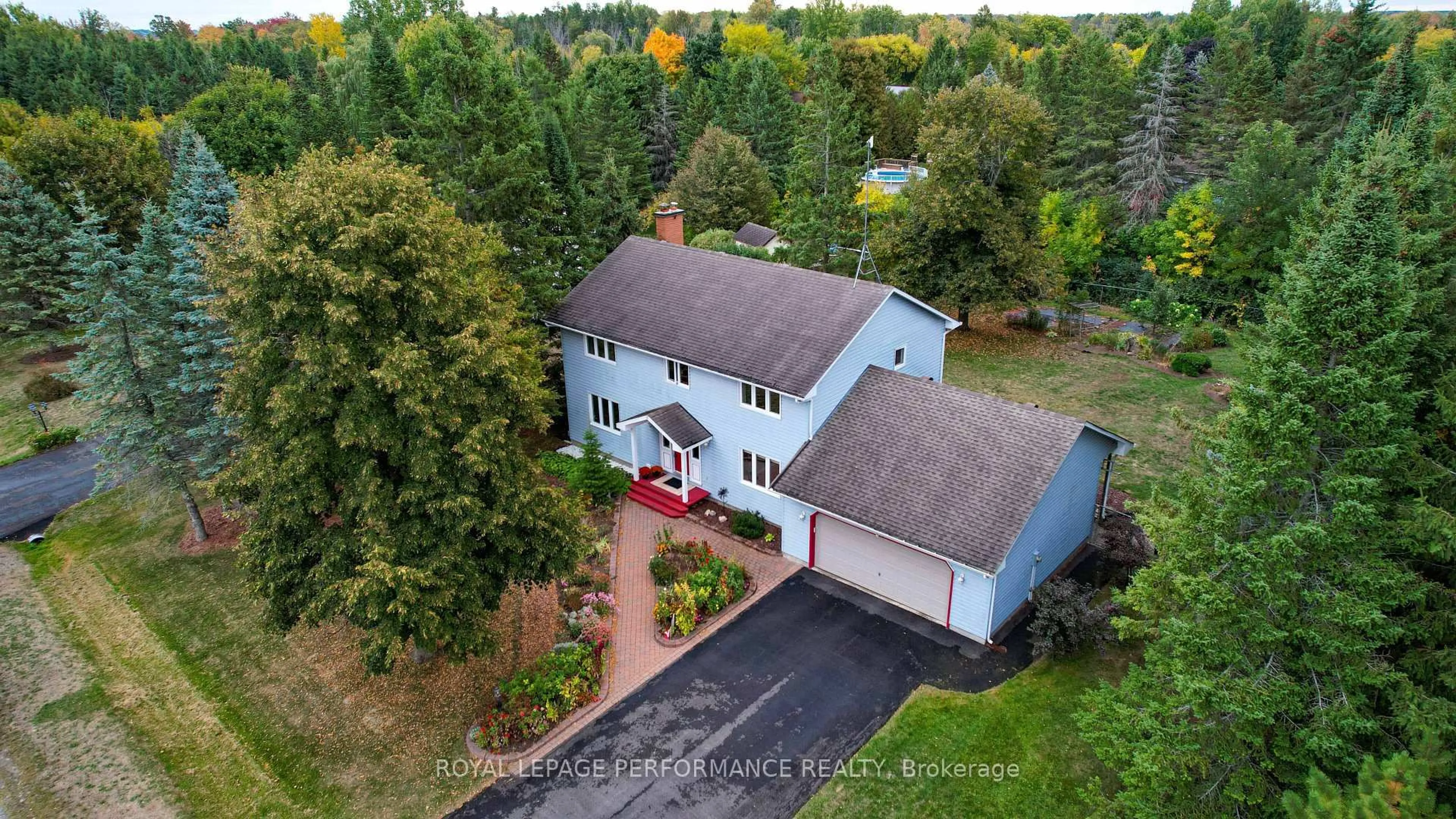 A pic from outside/outdoor area/front of a property/back of a property/a pic from drone, street for 1524 Blue Rock Ave, Kars Ontario K0A 2E0