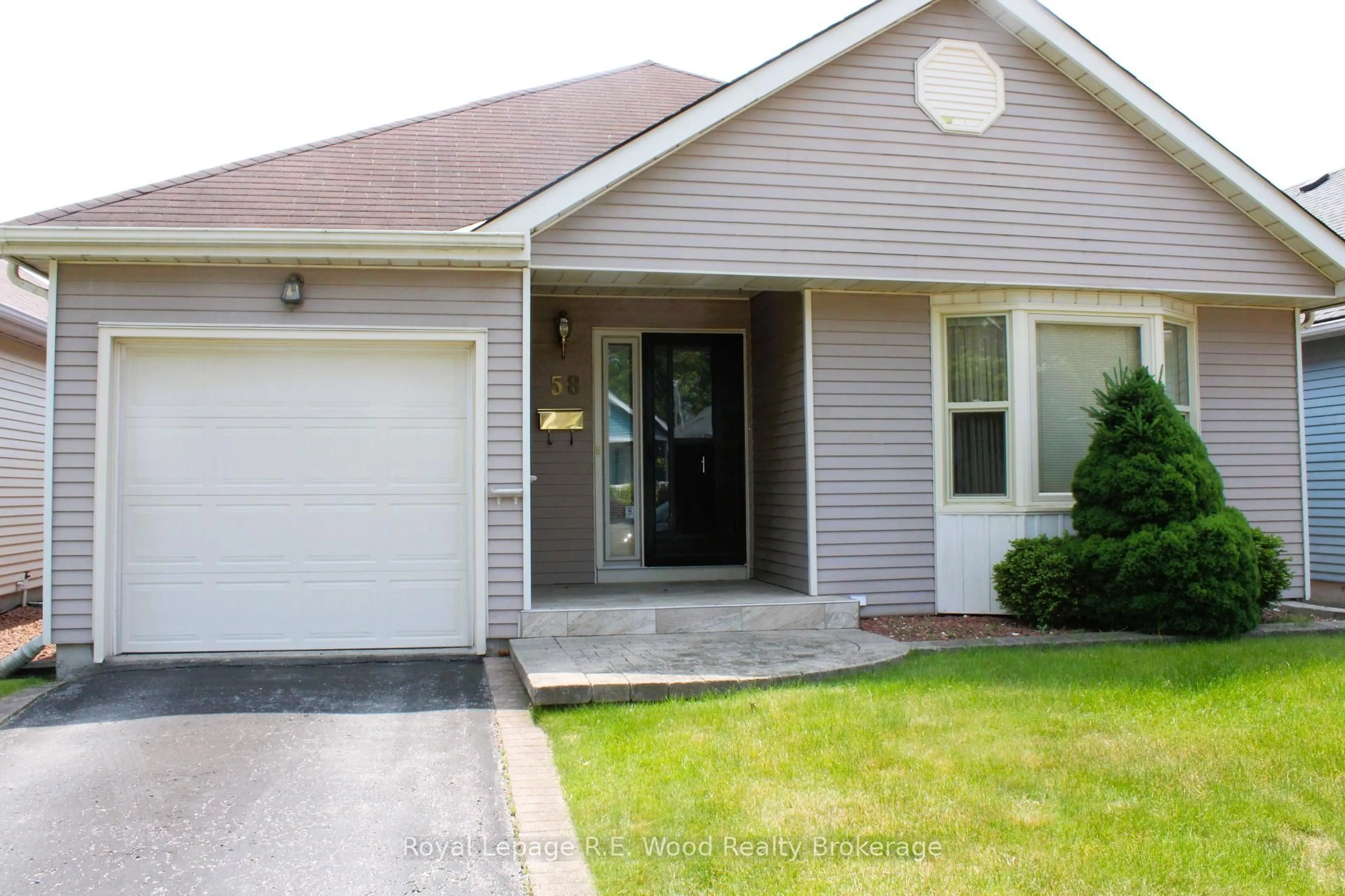Home with vinyl exterior material, street for 58 Hawkins Cres, Tillsonburg Ontario N4G 5K7