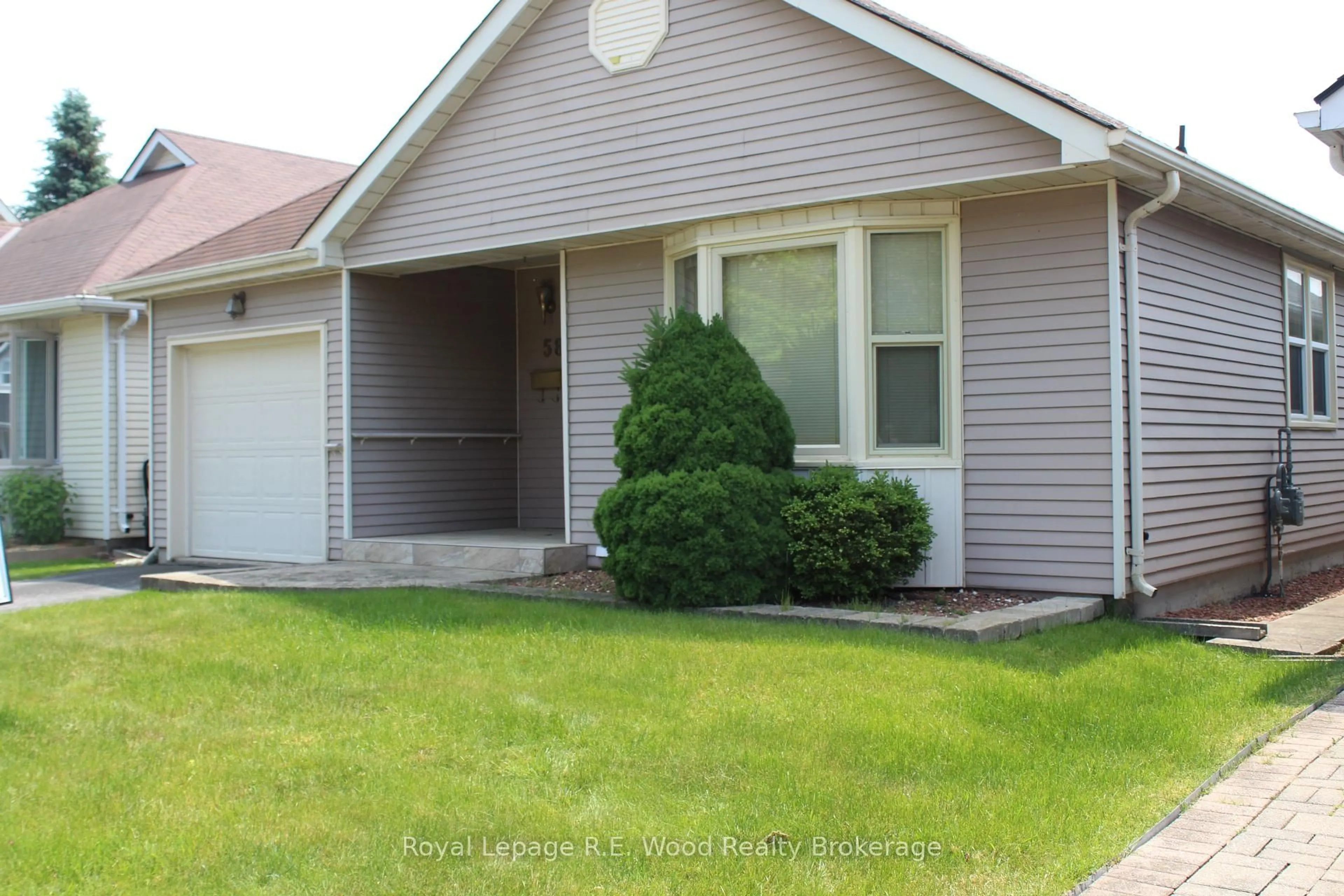 Home with vinyl exterior material, street for 58 Hawkins Cres, Tillsonburg Ontario N4G 5K7