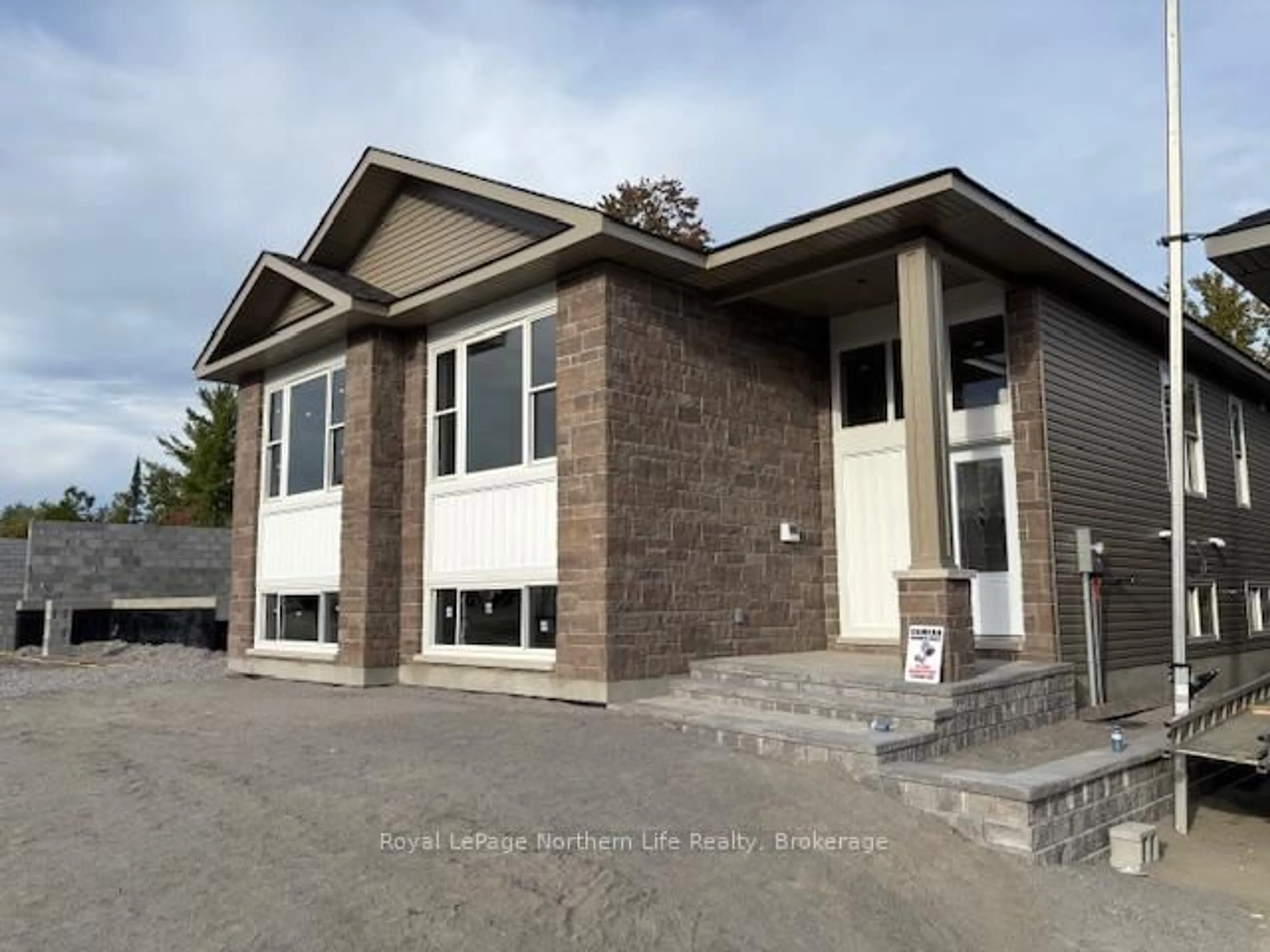 Home with brick exterior material, building for 18 Meadow Wood Crt, North Bay Ontario P1A 4L5