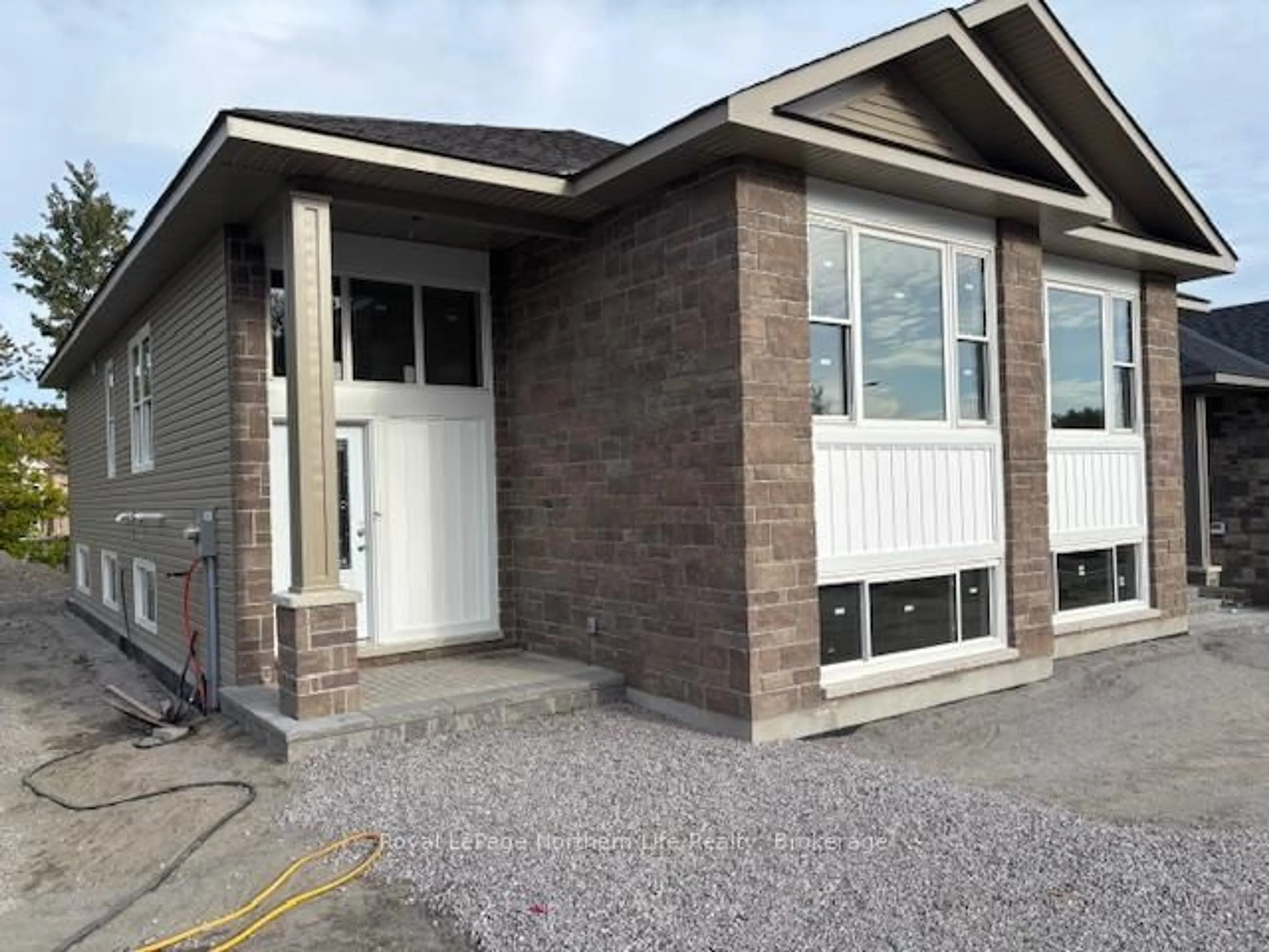 Home with brick exterior material, street for 20 Meadow Wood Crt, North Bay Ontario P1A 4L5