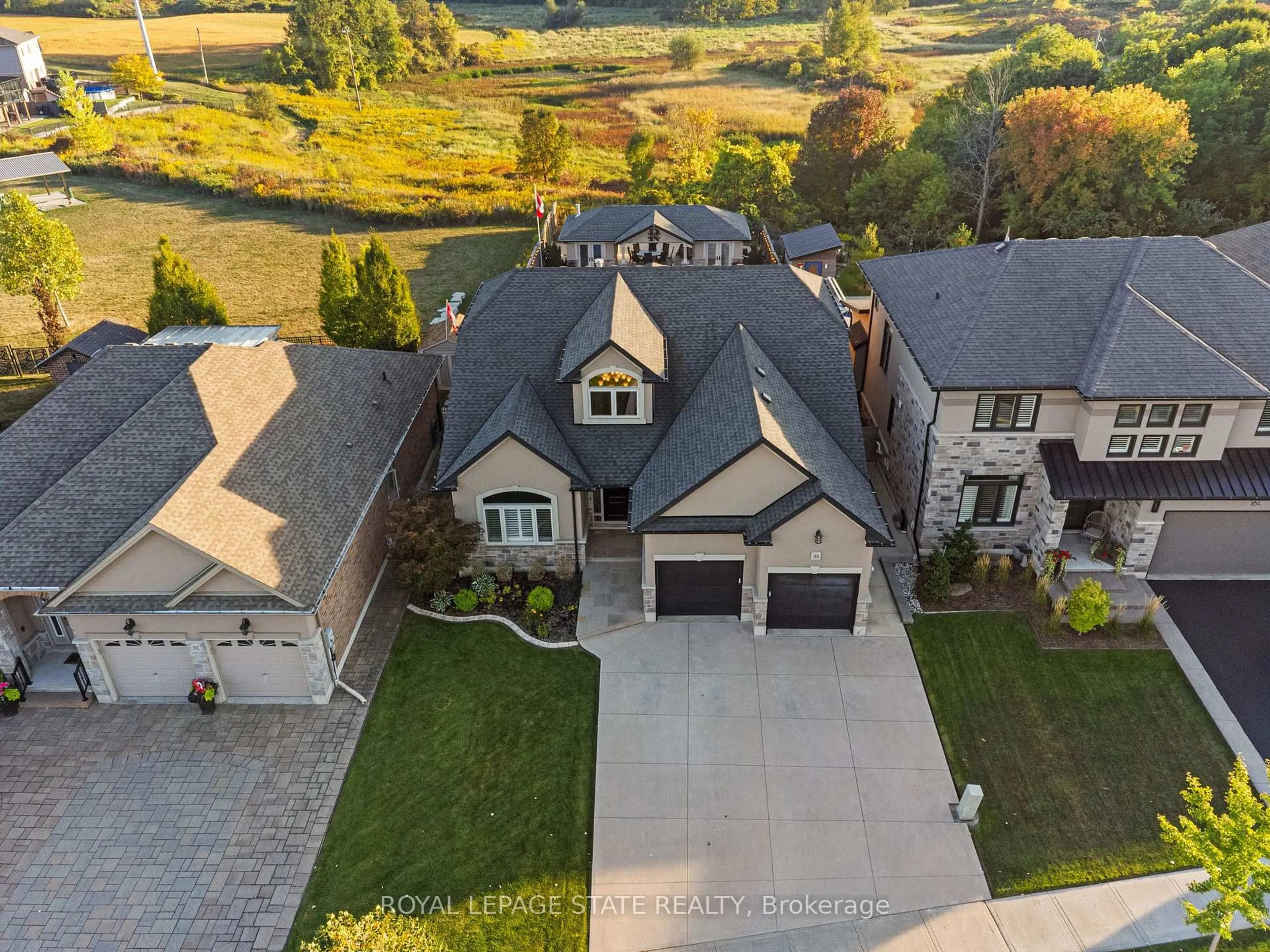 A pic from outside/outdoor area/front of a property/back of a property/a pic from drone, street for 188 Mother's St, Hamilton Ontario L9B 0E1