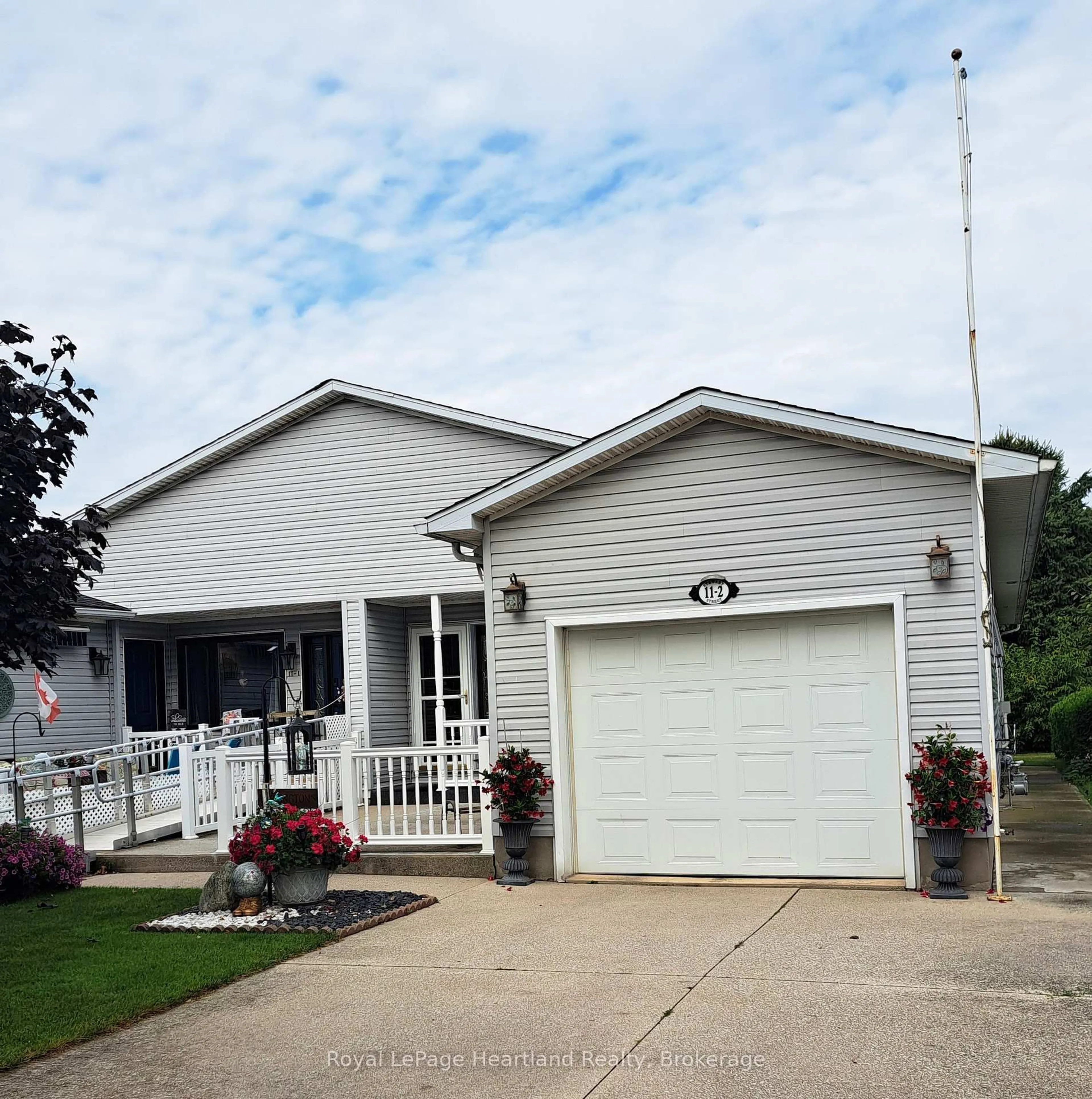 Home with vinyl exterior material, street for 11-2 STEWART St, Strathroy-Caradoc Ontario N7G 1A1