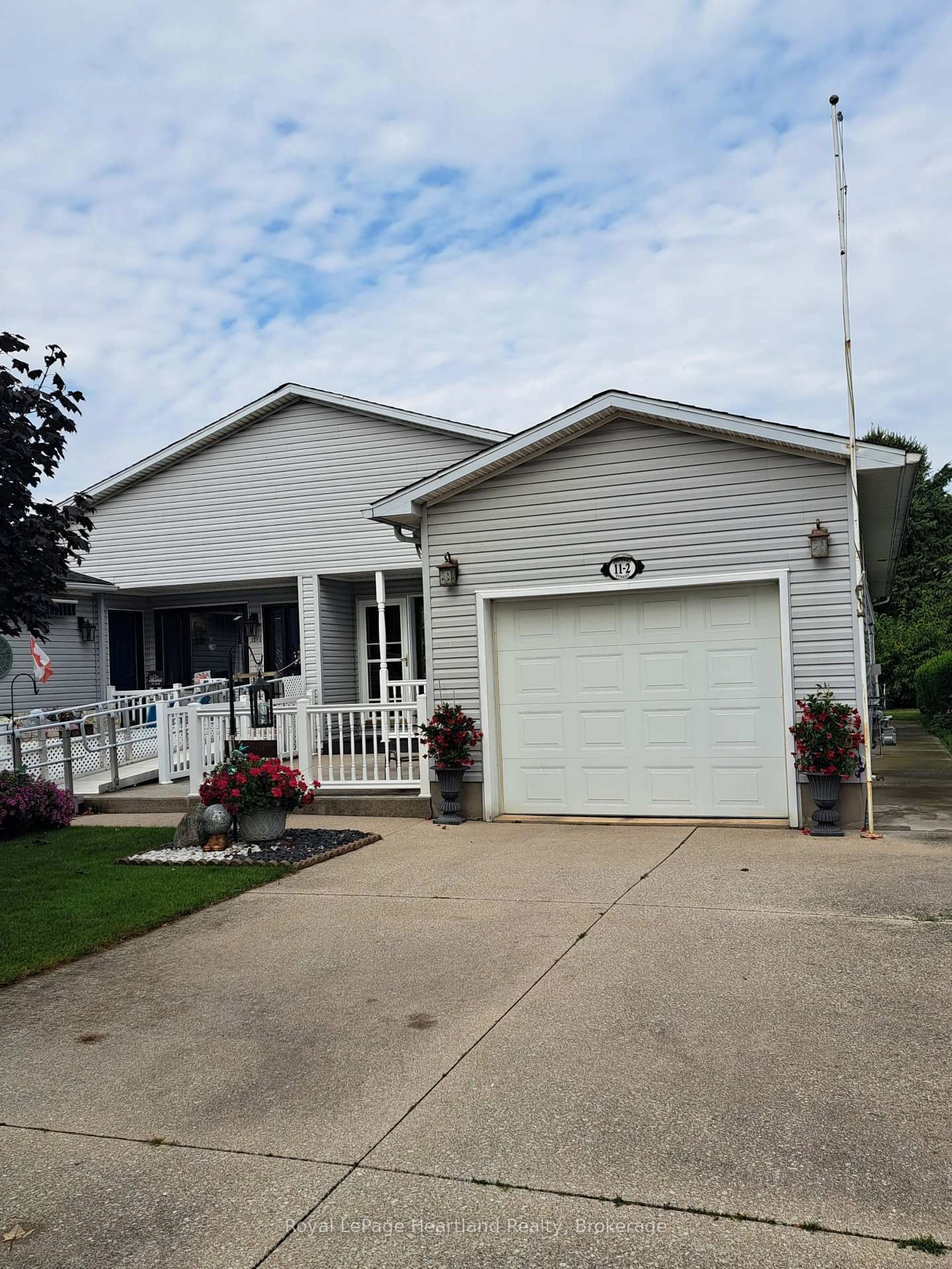 Home with vinyl exterior material, street for 11-2 STEWART St, Strathroy-Caradoc Ontario N7G 1A1