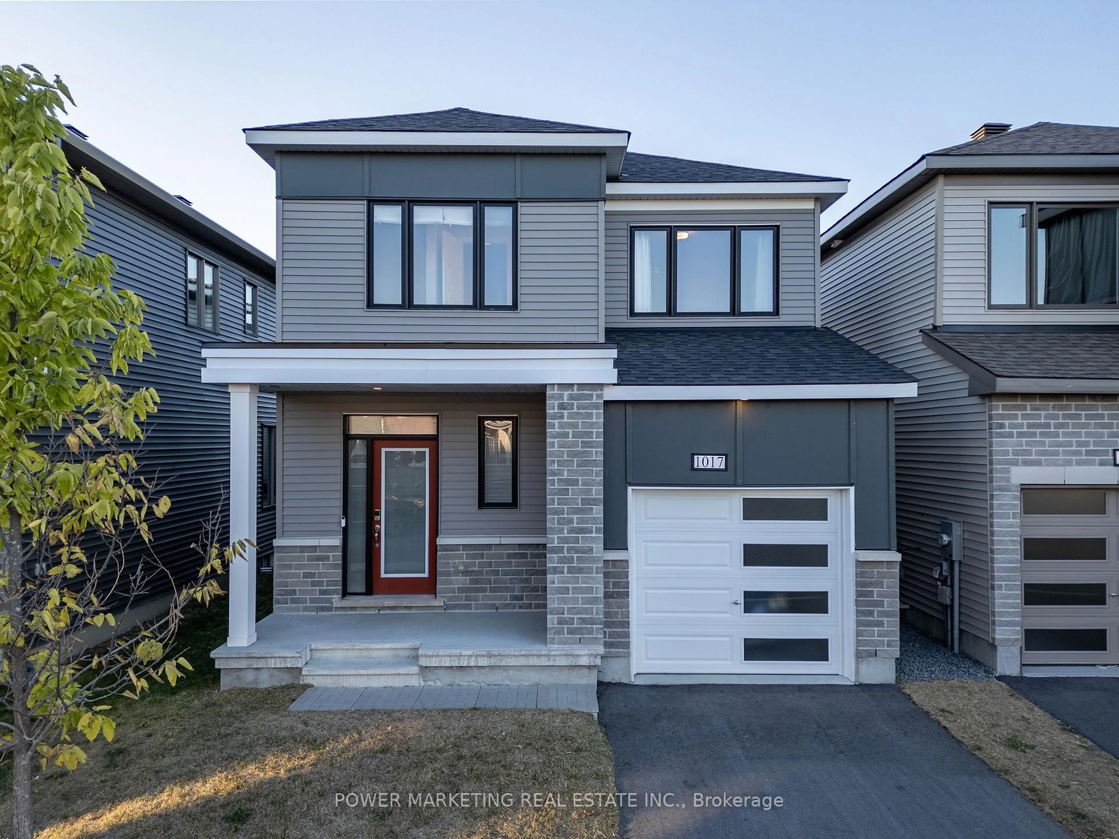 Home with brick exterior material, street for 1017 Curraglass Walk, Stittsville Ontario K2S 3A6